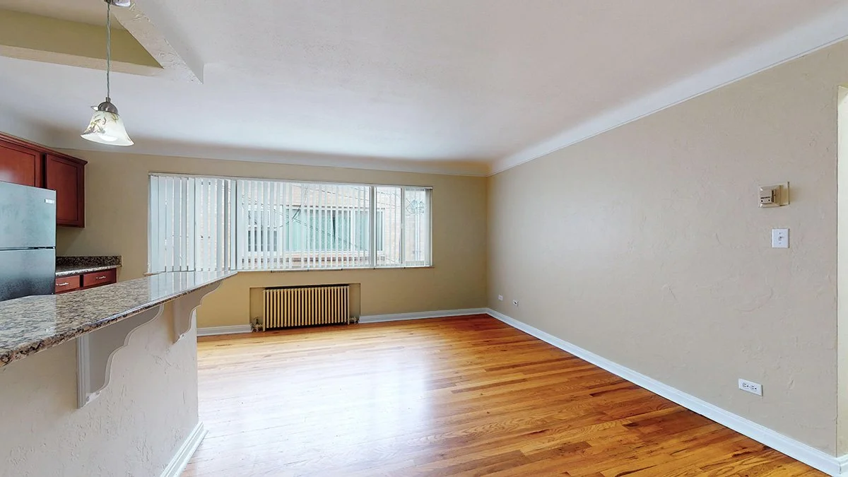 wh_parkhillflats_unit207_794sf_living1_1200x675.jpg