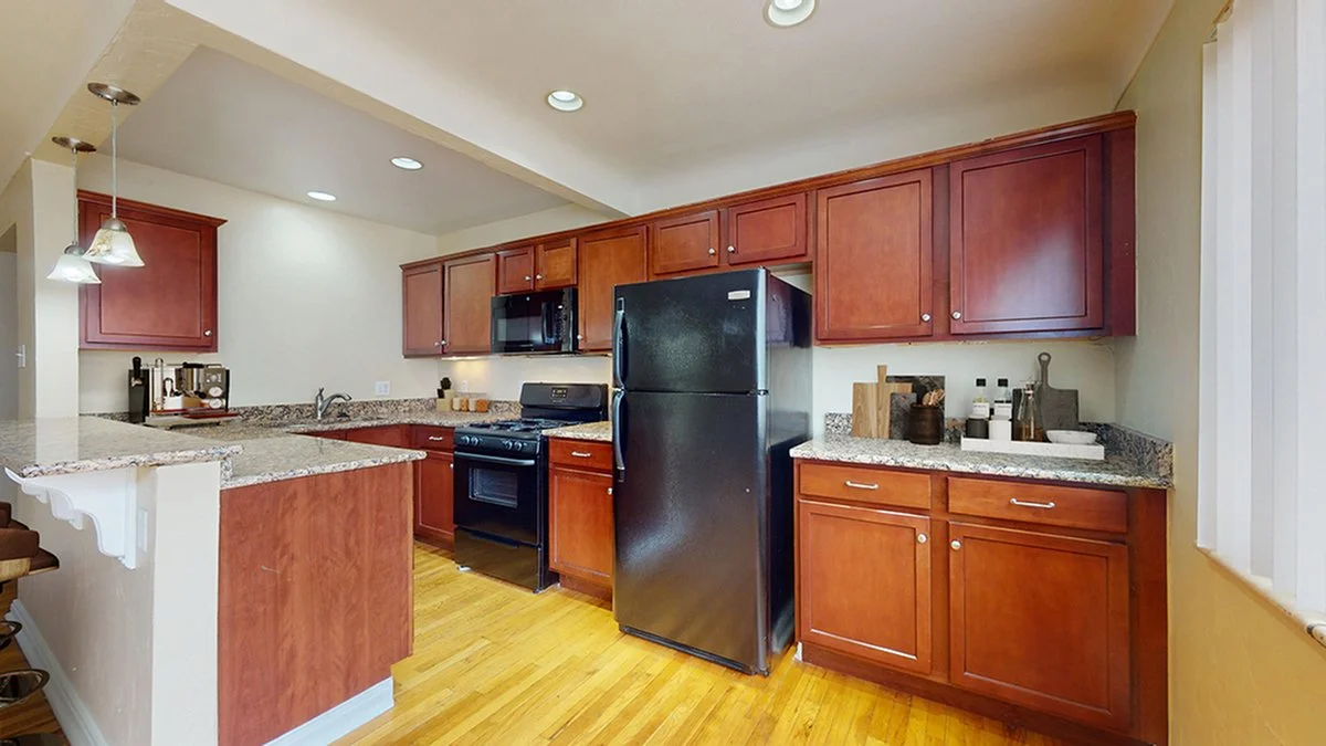 parkhillflats_unit207_STAGED_kitchen2_1200x675.jpg