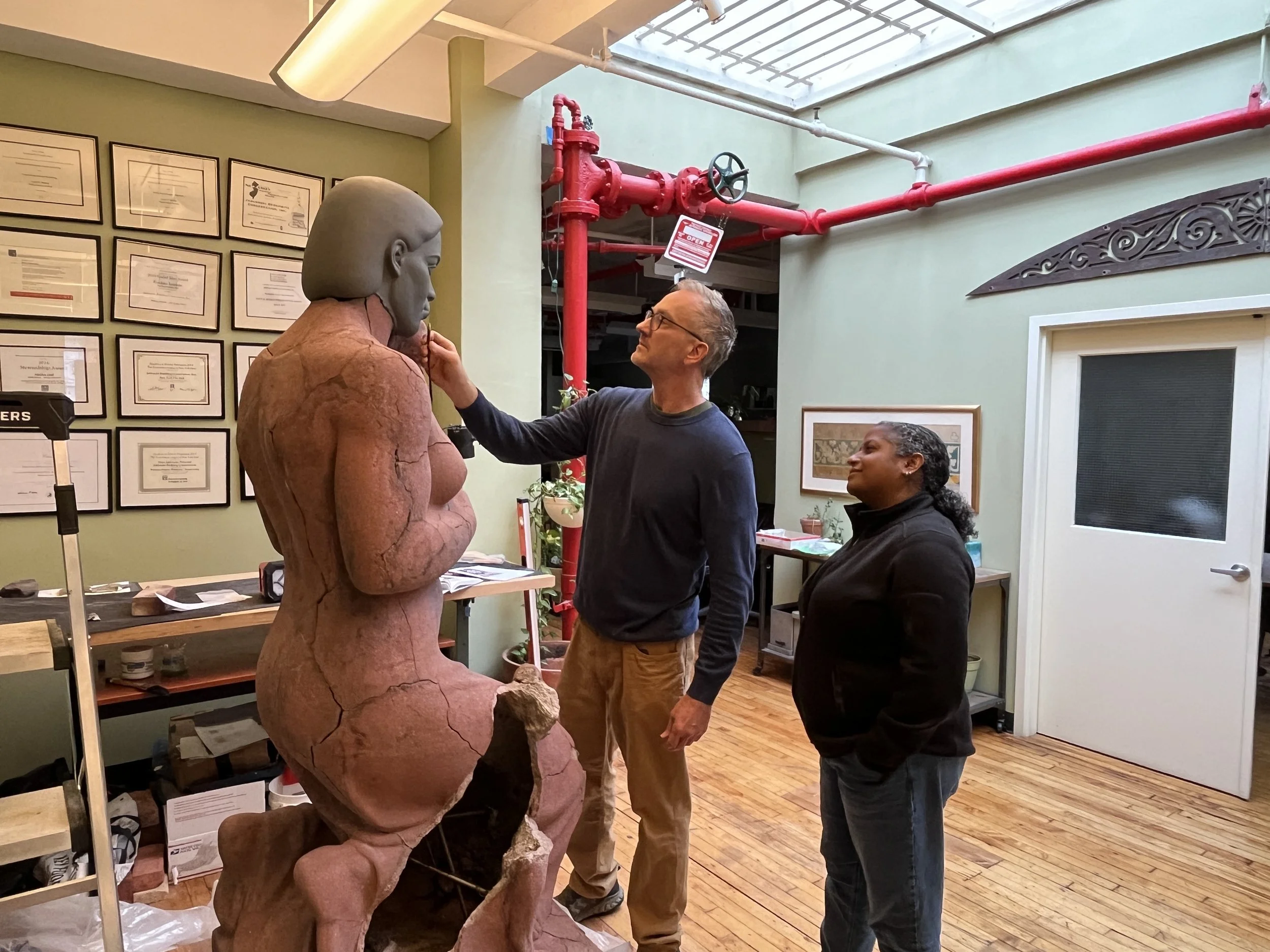A sculptor and conservator collaborate to recreate a sculpture's missing head.