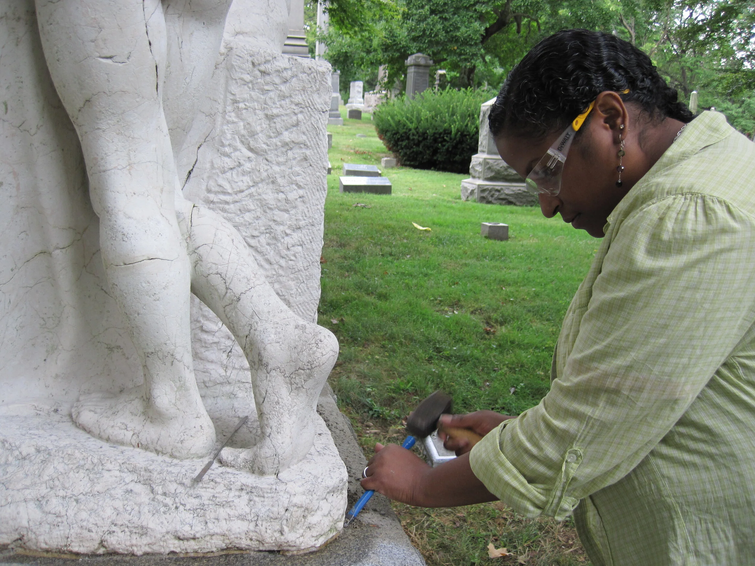 Raking a joint in preparation for repointing.