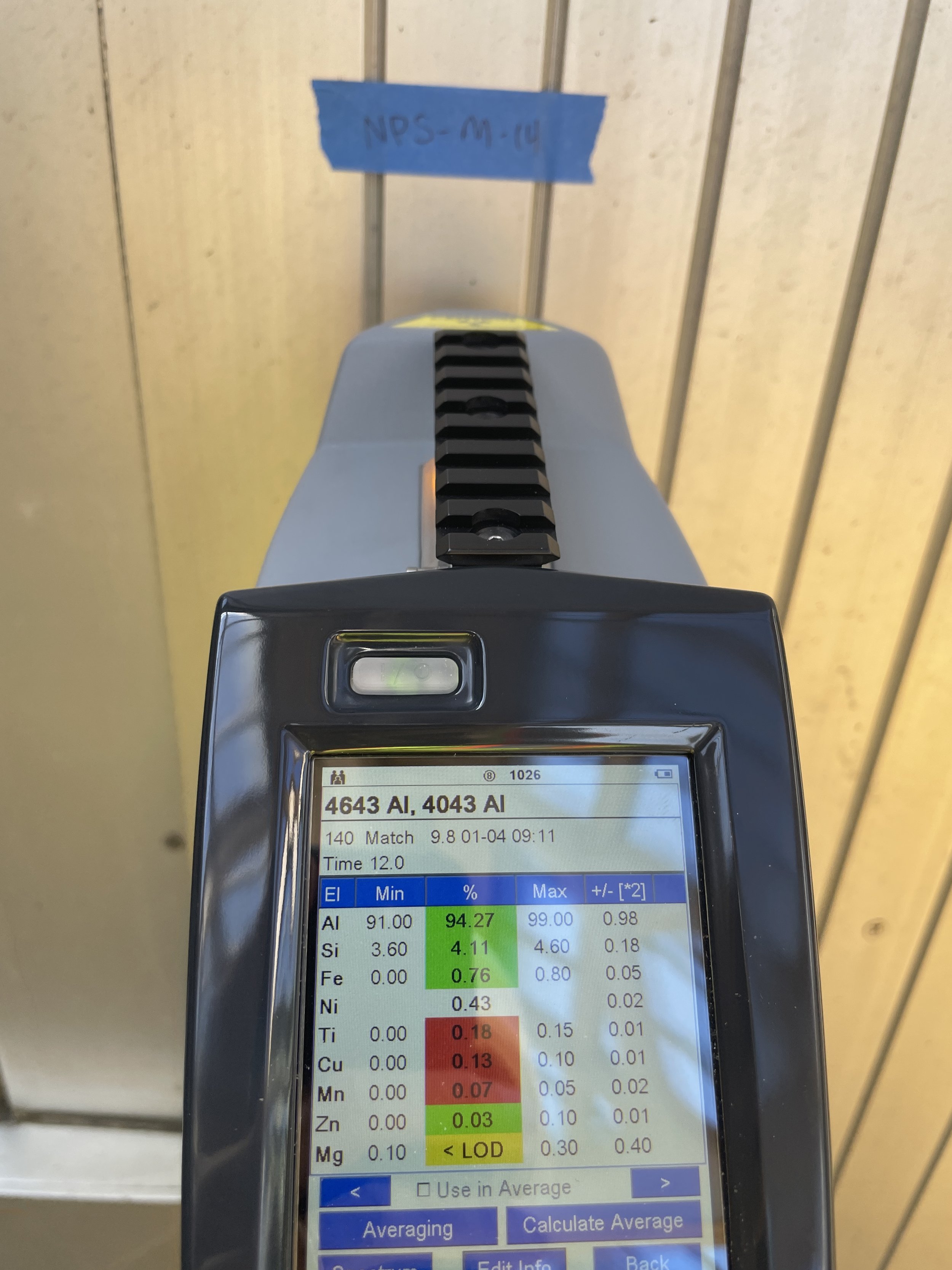 Using a portable XRF spectrometer to identify metal alloys on site.