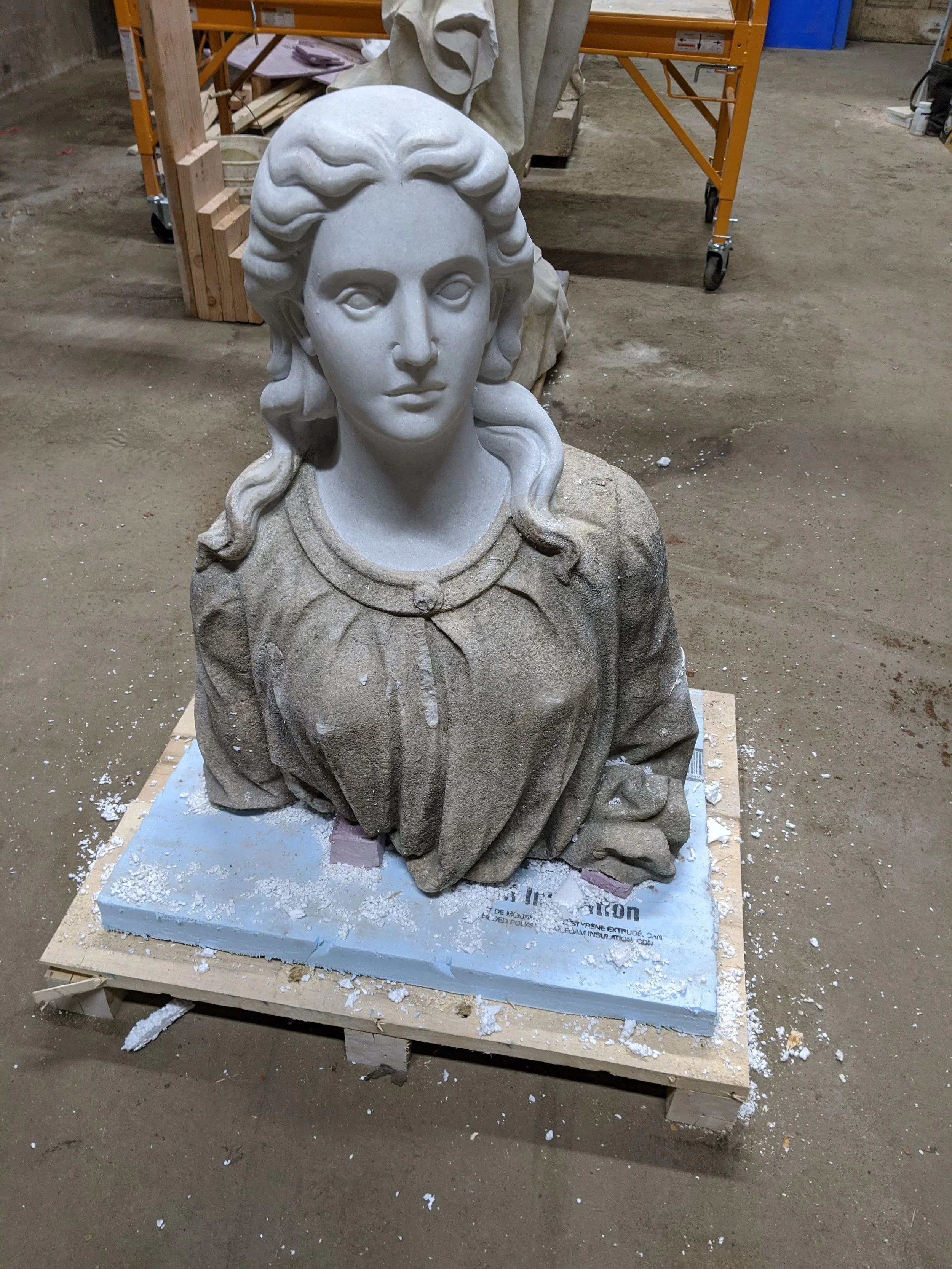 A re-carved head on an original torso.