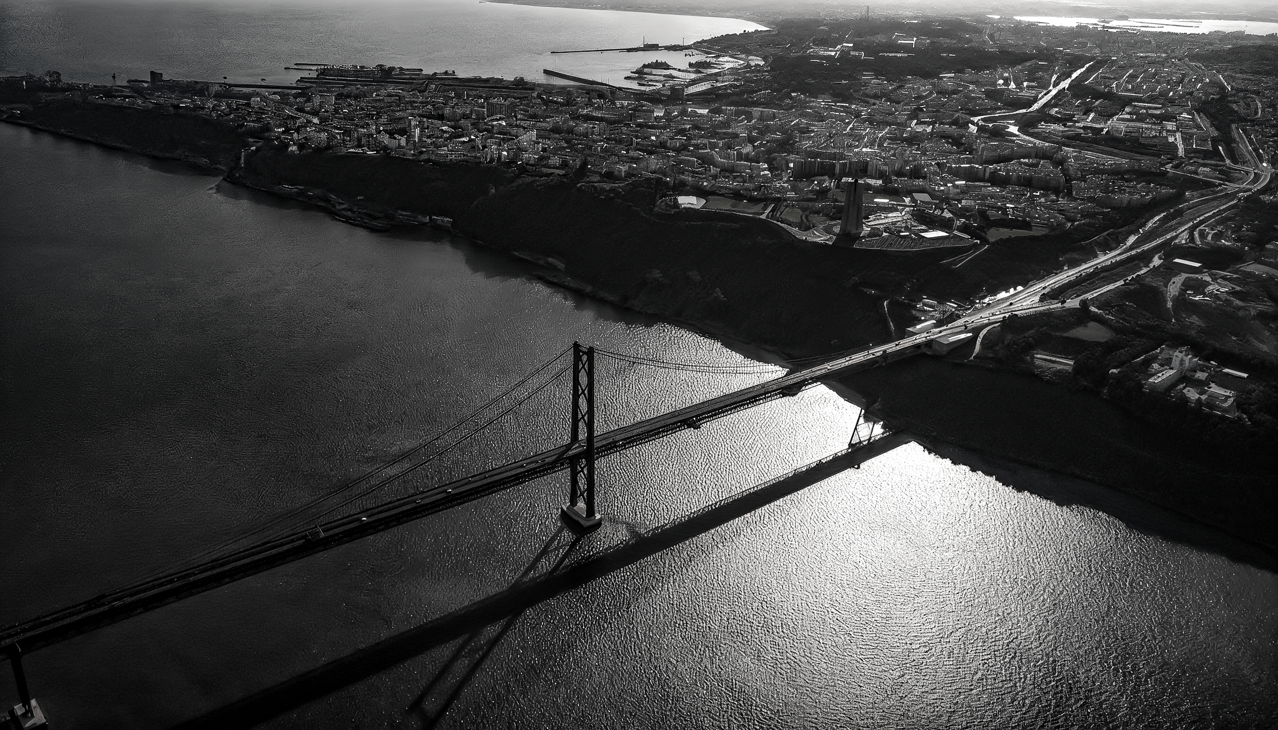 freepik__an-aerial-view-of-a-grand-suspension-bridge-spanni__29956.png