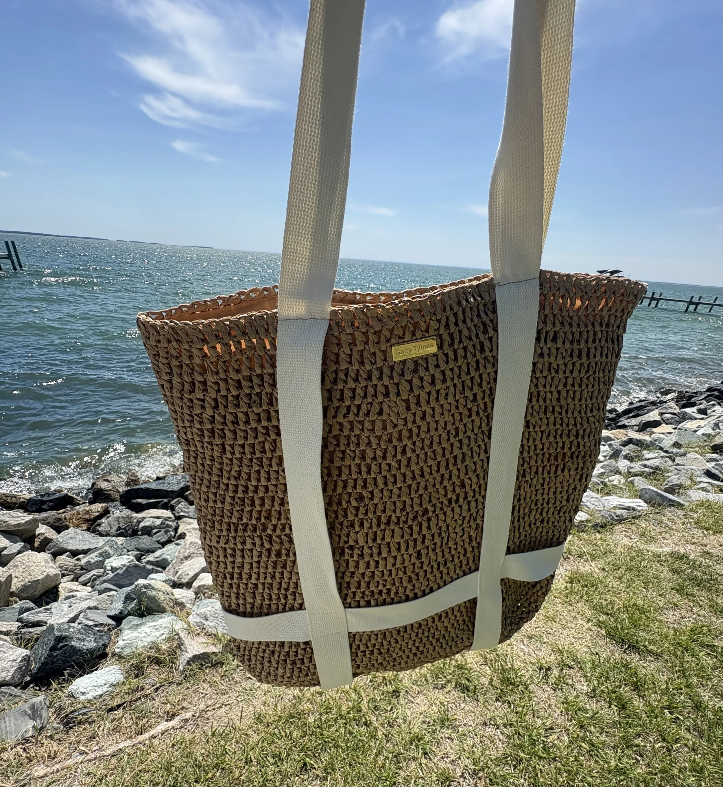 Salty Tymes Hat bag, over water.jpg