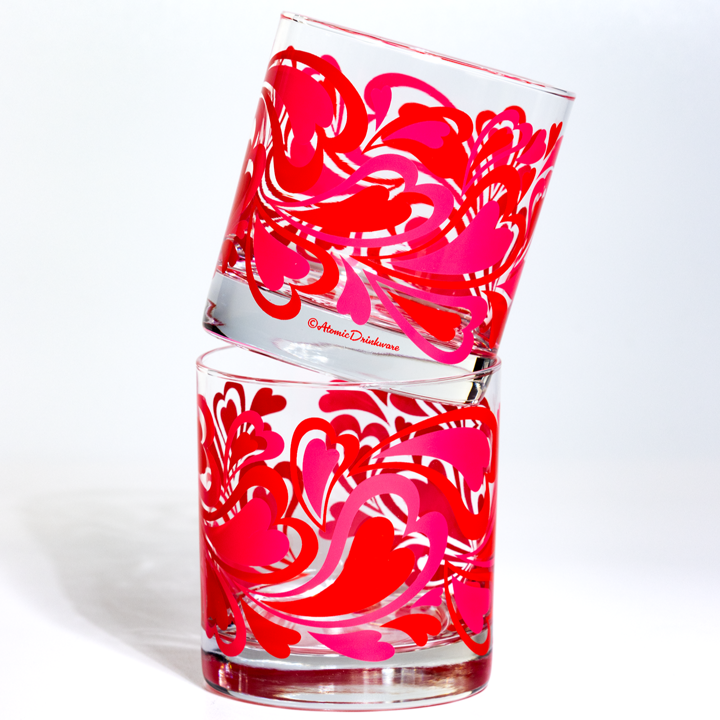 Two Groovy Hearts Valentine's Rocks Glasses on white in stack