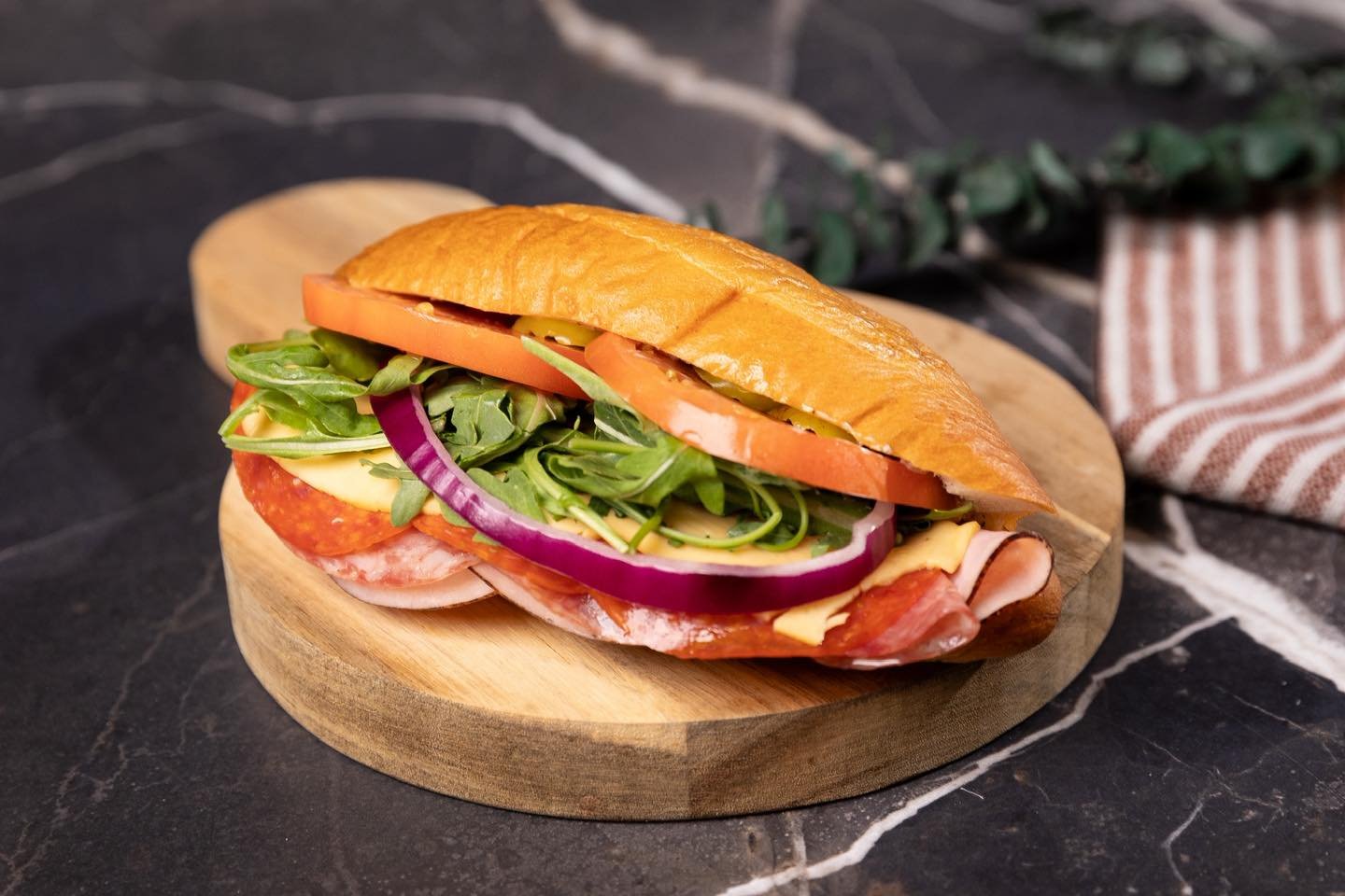 🥪NEW MONTH, NEW SAMMIE🥪

THE DON ITALIANO 🤌🏼

Our version of an Italian sub. Pesto focaccia bread loaded with salami, capicola, ham and pepperoni, smoked gouda, arugula, tomato, red onion, and finished with cherry pepper spread and house-made ita