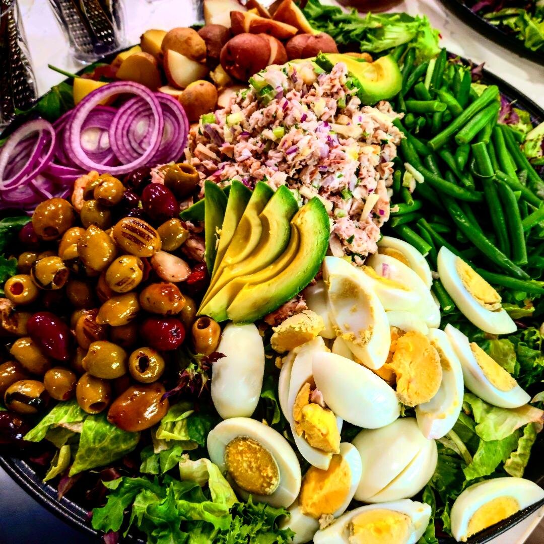 Smoked yellow tail nicoise salad, grilled marinated olives, boiled button potatoes, and french long beans.