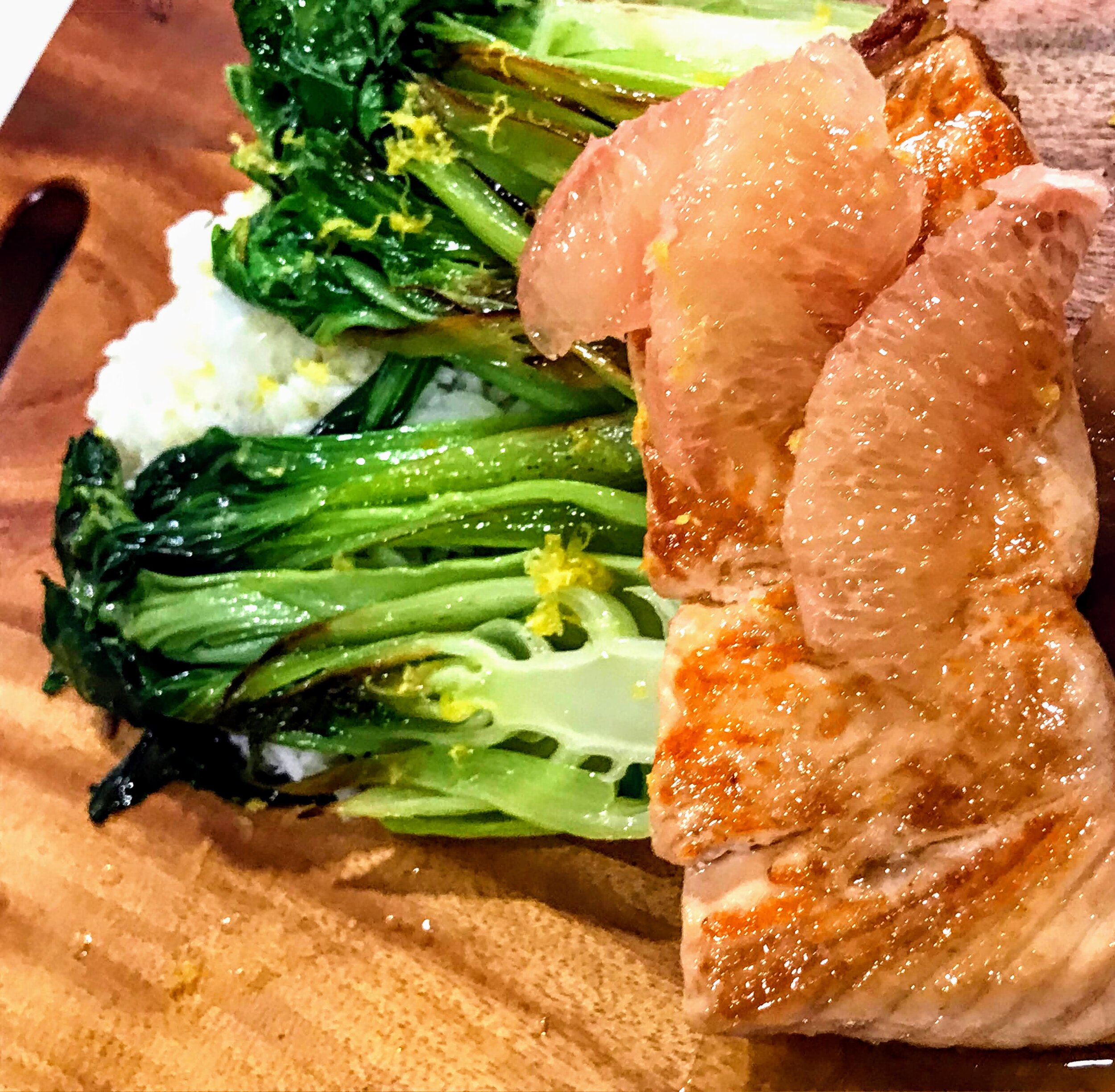 Citrus cedar-plank salmon, braised baby bok-choy, and citrus Jasmin butter rice.