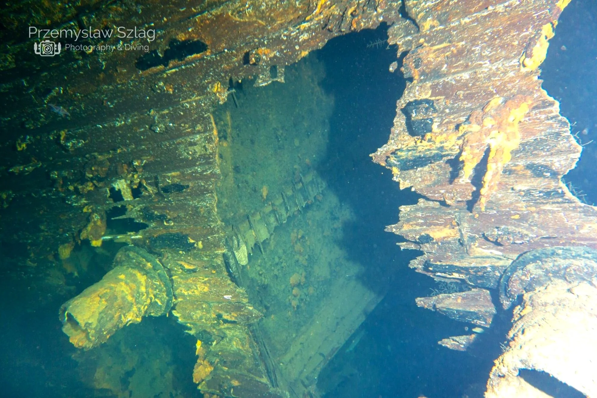 Scuba diving murky ship wreck
