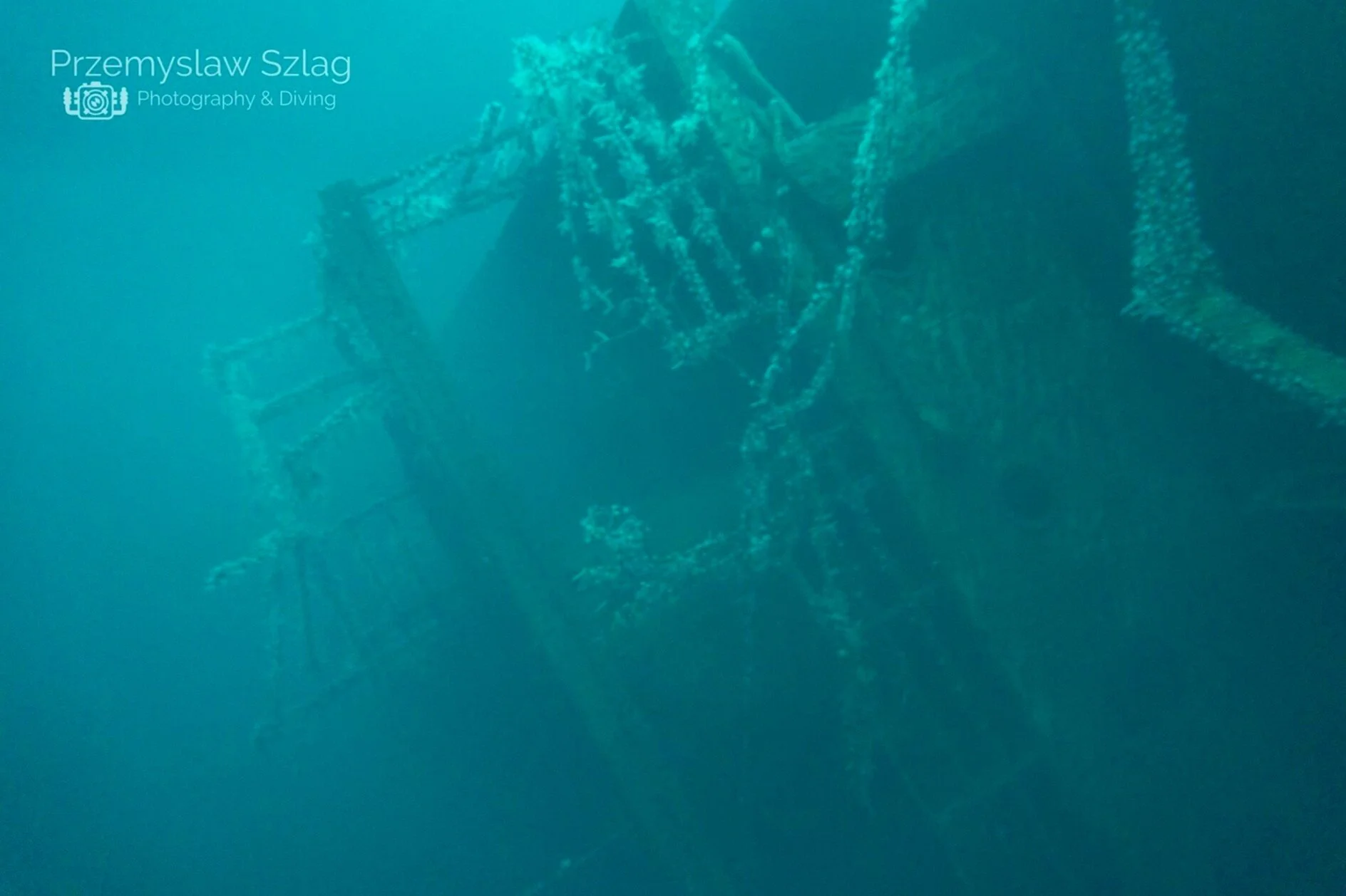 Scuba diving murky ship wreck