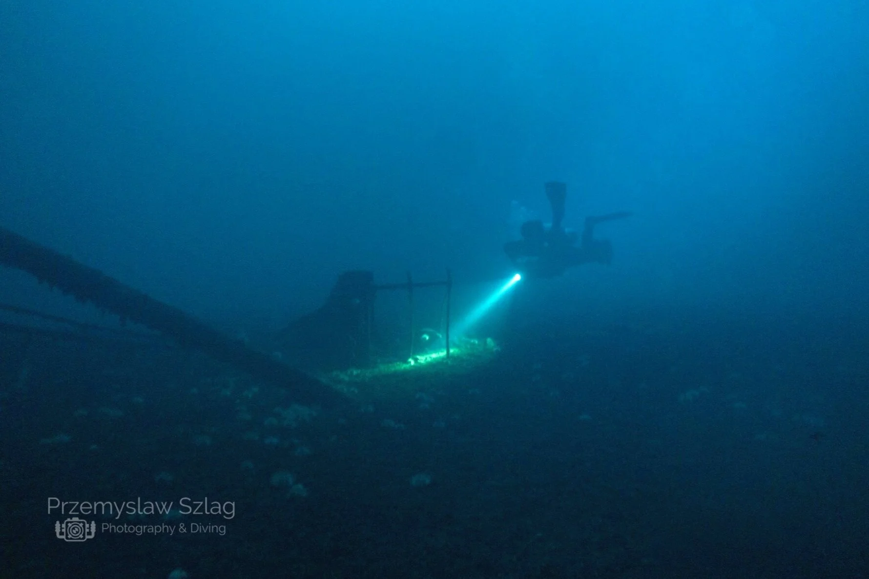 Scuba diving murky ship wreck