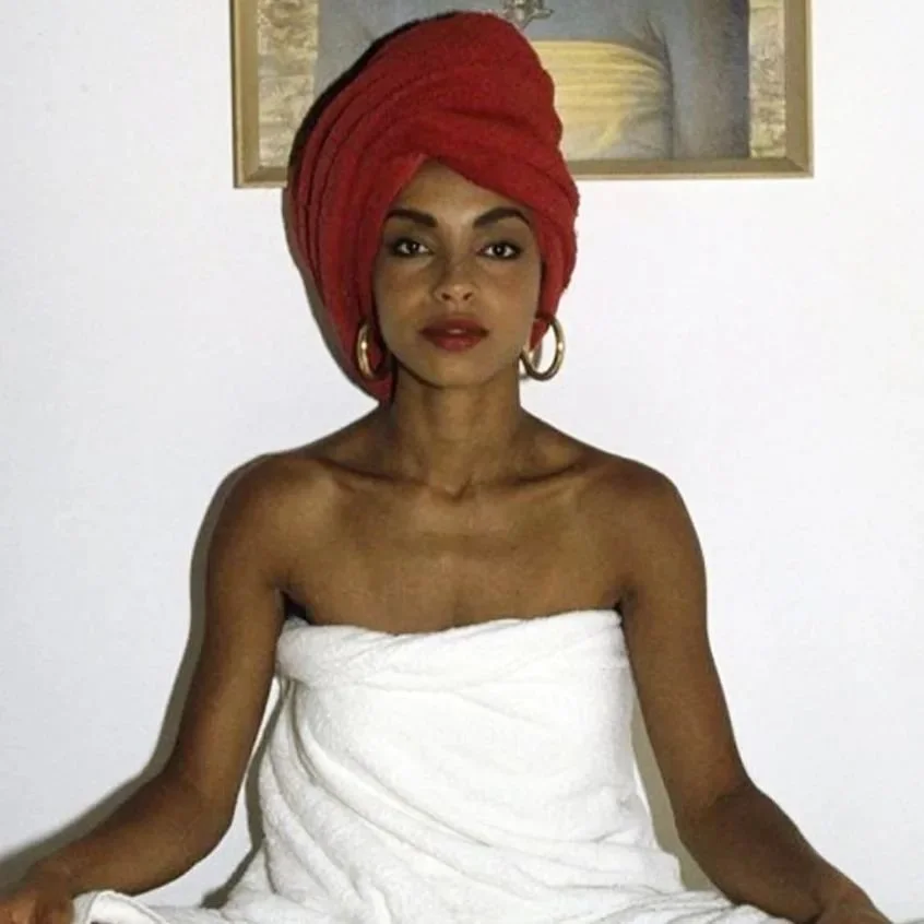 Sade serving us all the lipstick and earring lewks 🤍✨🤍✨🤍✨

#goldhoopsfordays #chunkyhoops #chonkyearrings #turbietowel #lipstickgoals #accessoriesoftheday #stylegram #throwback #vintagesade #sade #80s