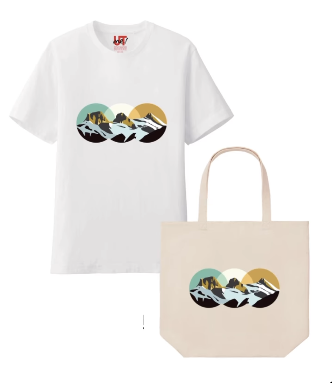 A white T-shirt and a beige tote bag with a mountain landscape design featuring mountains and a setting or rising sun, both items displayed against a white background.