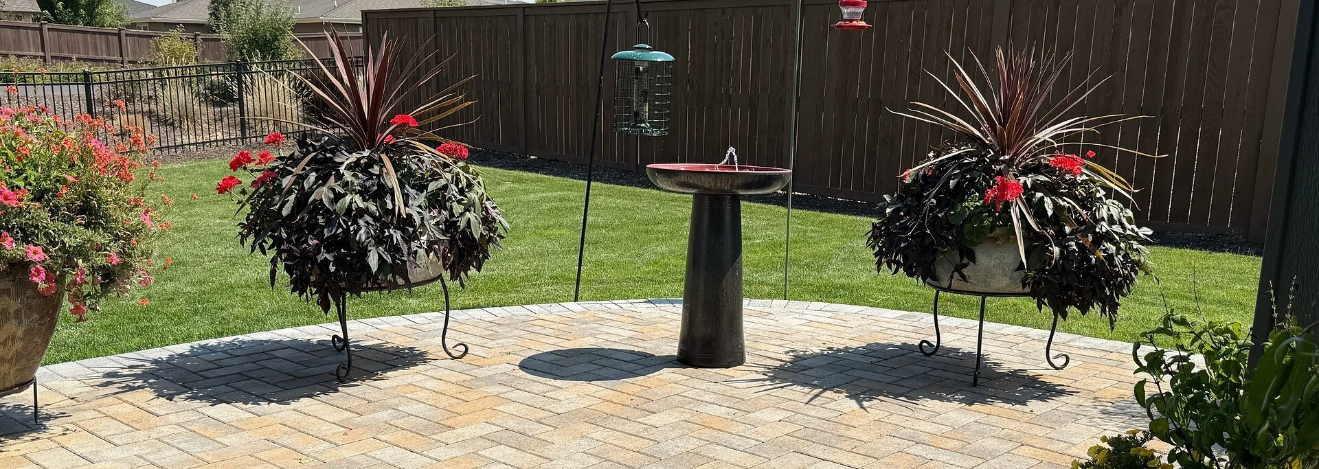  First Prize &middot; 2026  Sherry James  Sherry James framed her black and red birdbath between two matching arrangements (in our pots). Such a perfectly coordinated scene with beautiful &amp; stylish plantings makes the birds feel properly apprecia