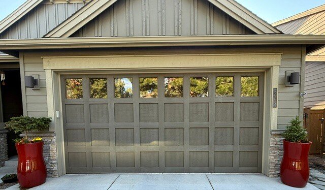  Third Prize &middot; 2026  Marci Schuler  Marci Schuler chose two of our tall, Lavish Red hourglass-shaped planters to frame her handsome garage. Marci's photo shows how just a couple of pops of color can really complement a neutral background, maki