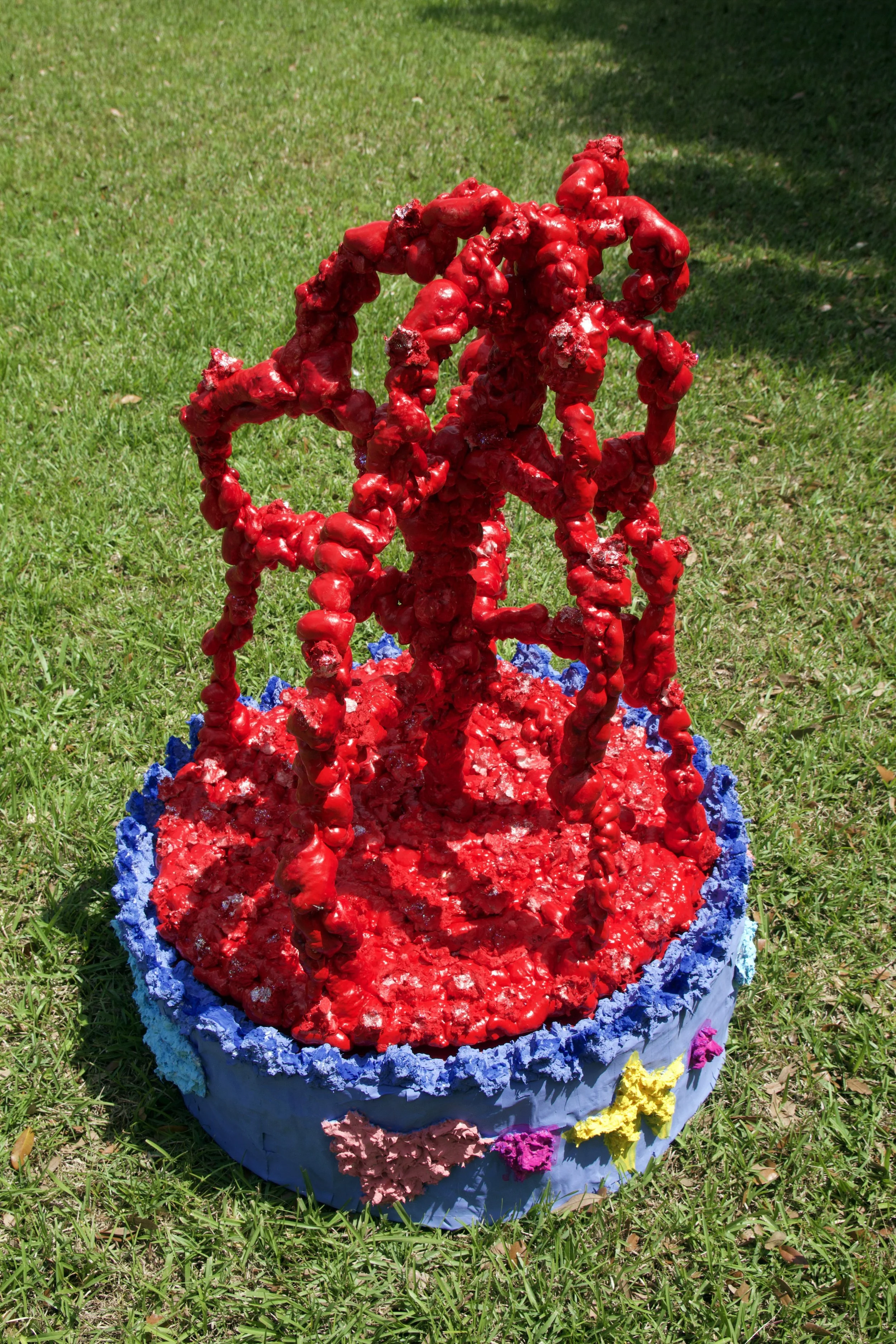 Mother of Blood, paper pulp, spray foam, paint, glitter, cardboard