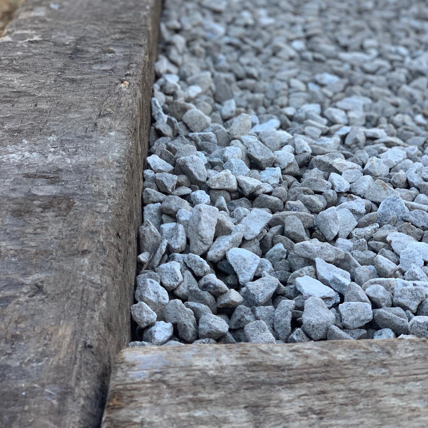 GRAVEL DRIVEWAY:

We installed this gravel parking pad for a client who needed extra parking behind their property