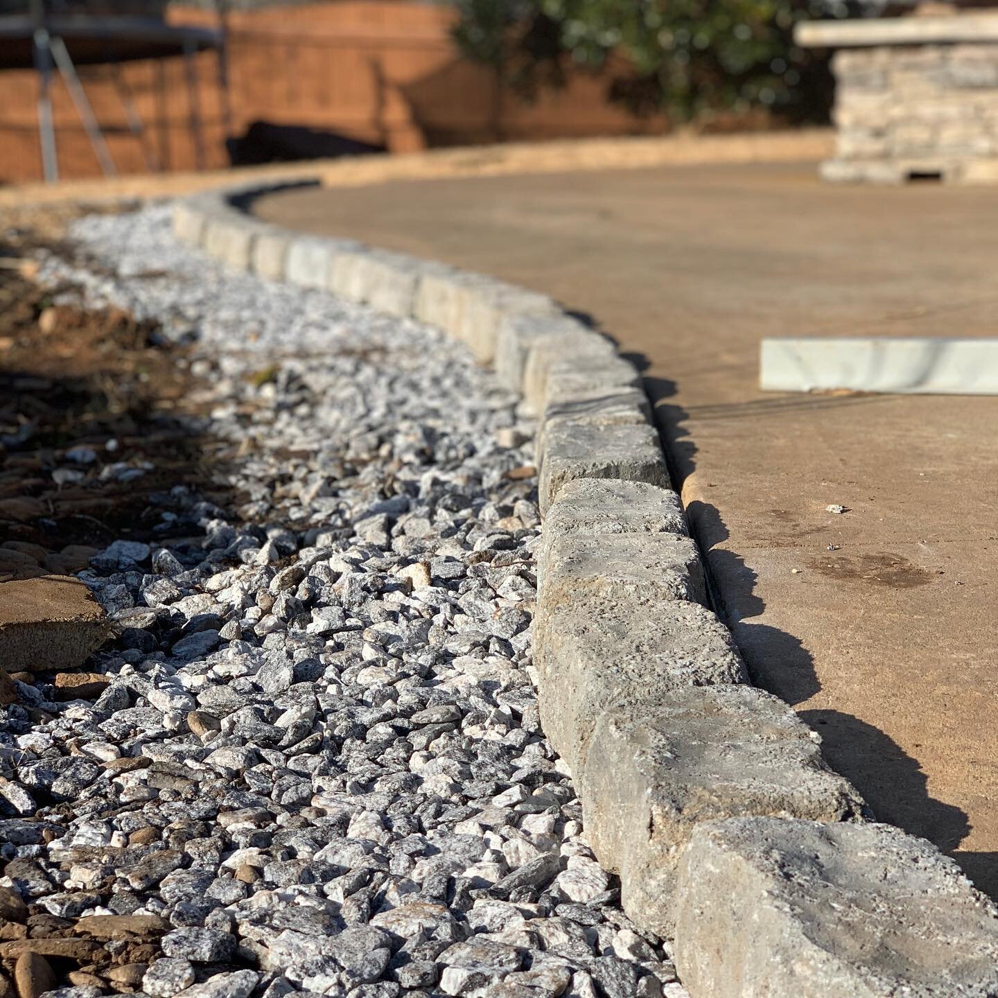 BOARDERS:

Adding a boarder helps keep mulch and dirt in the beds but also adds a nice transition between the concrete and natural areas. Check out these progress shots from a recent boarder install!
