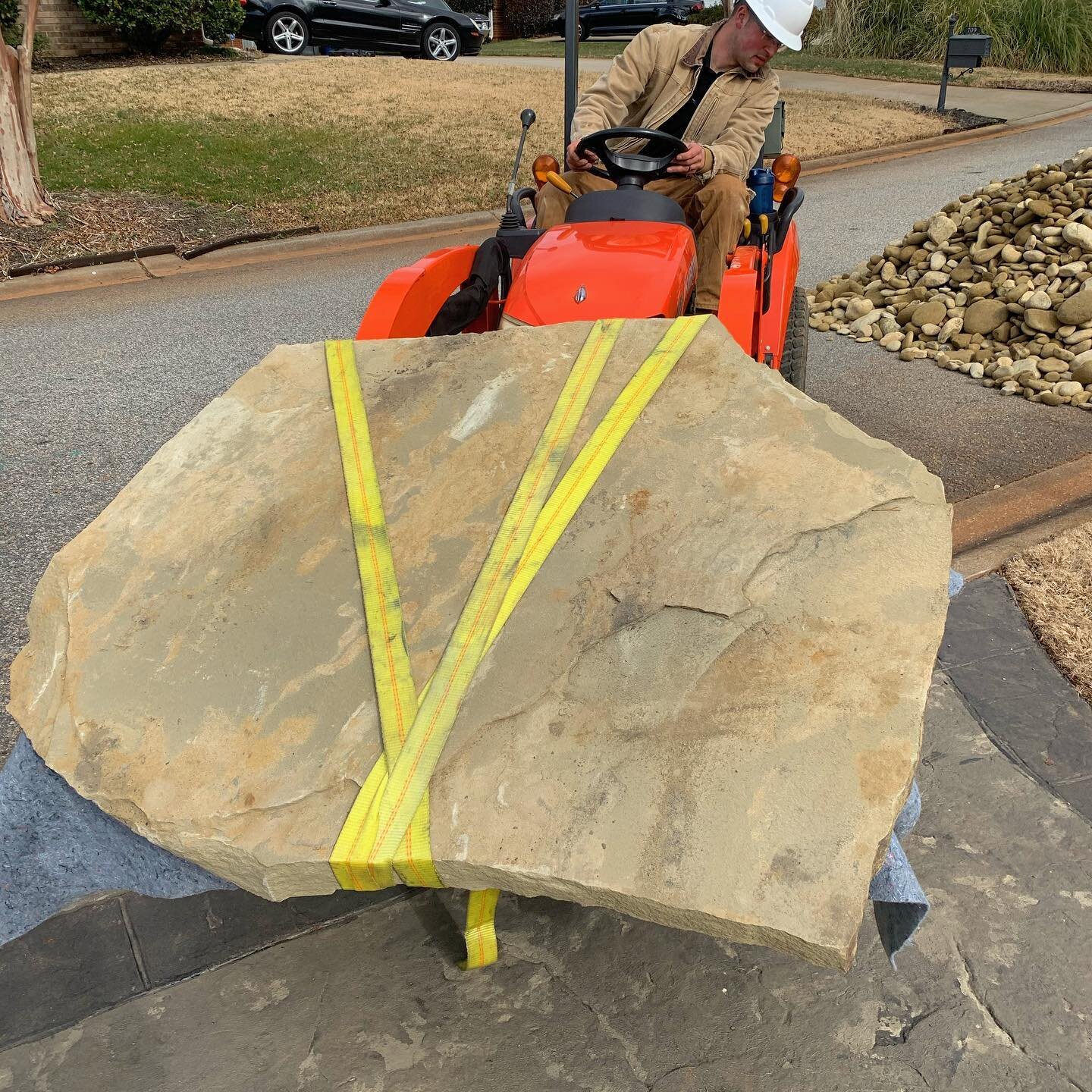 STONE BRIDGE:

Adding these slabs to a dry creek bed to allow our client to access the back of their property. 

These stones blend into the environment seamlessly and provide a great function.