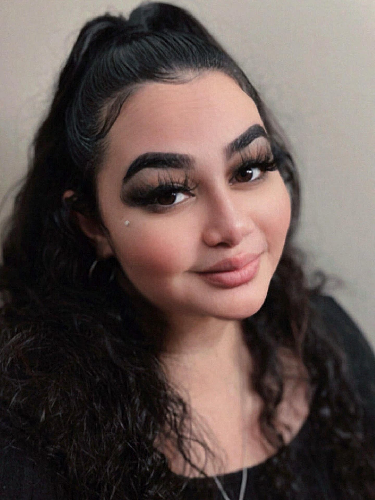 Puerto Rican woman black hair tattoos