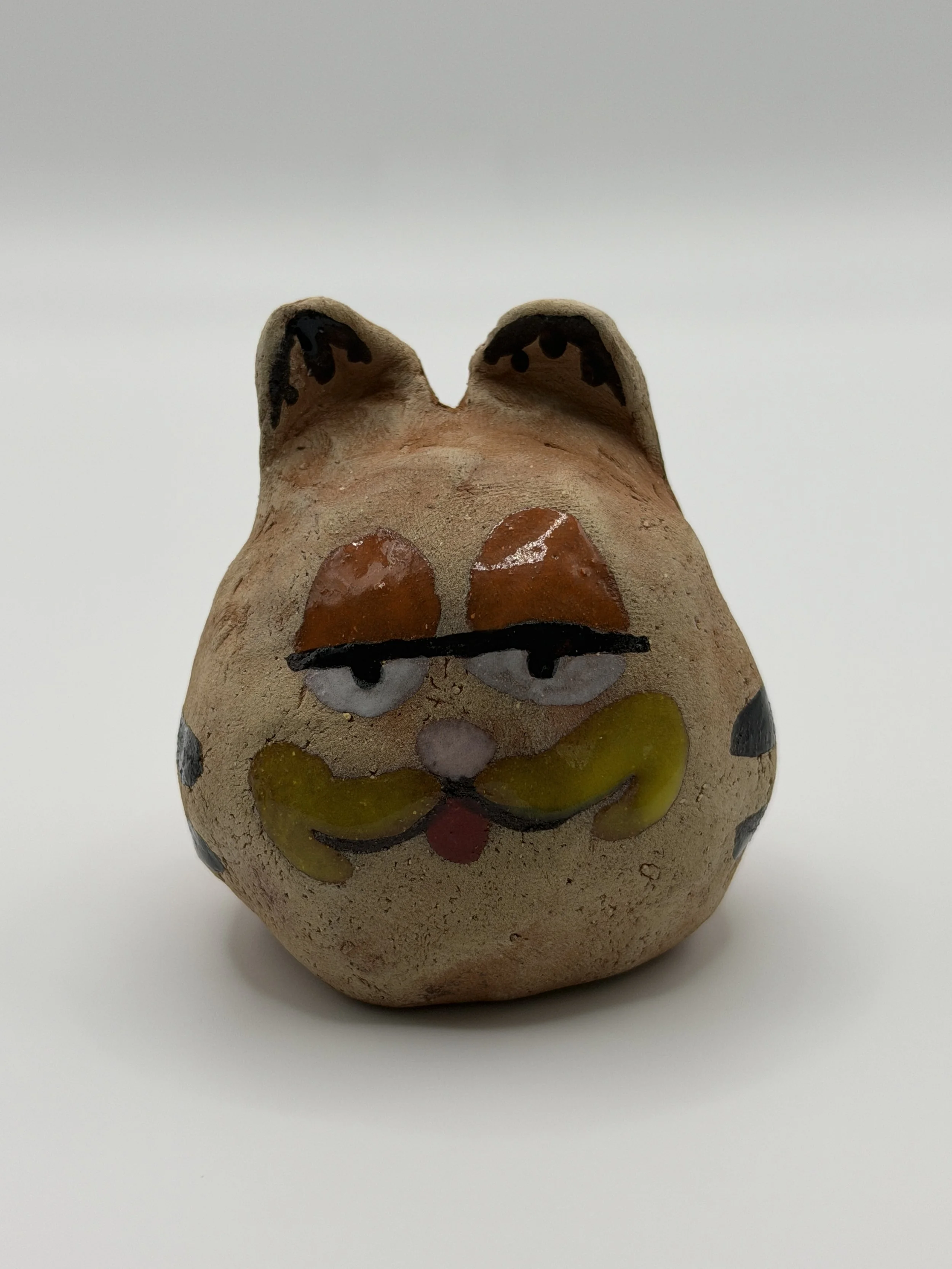 GARFIELD HEAD, glazed ceramic, 2.5" x 2" x 2", 2026