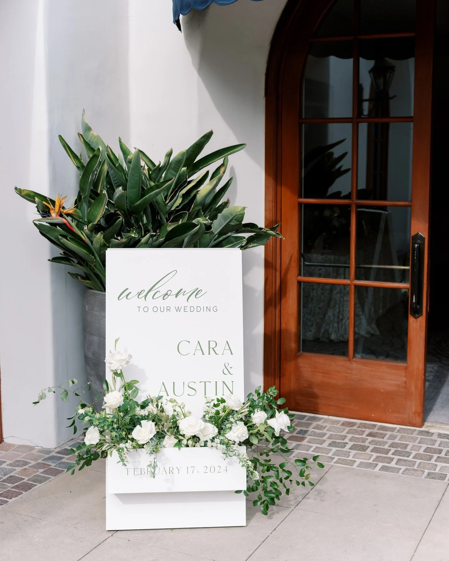 A warm welcome to forever 💚⁠
This timeless sign for C + A set the tone for a celebration full of love, elegance, and intentional details. ✨⁠
⁠
Pictured: Floral Box A-Frame⁠
⁠
⁠
VENDOR DREAM TEAM ⁠
Planning &amp; design @meganrose_events⁠
Venue @ritz