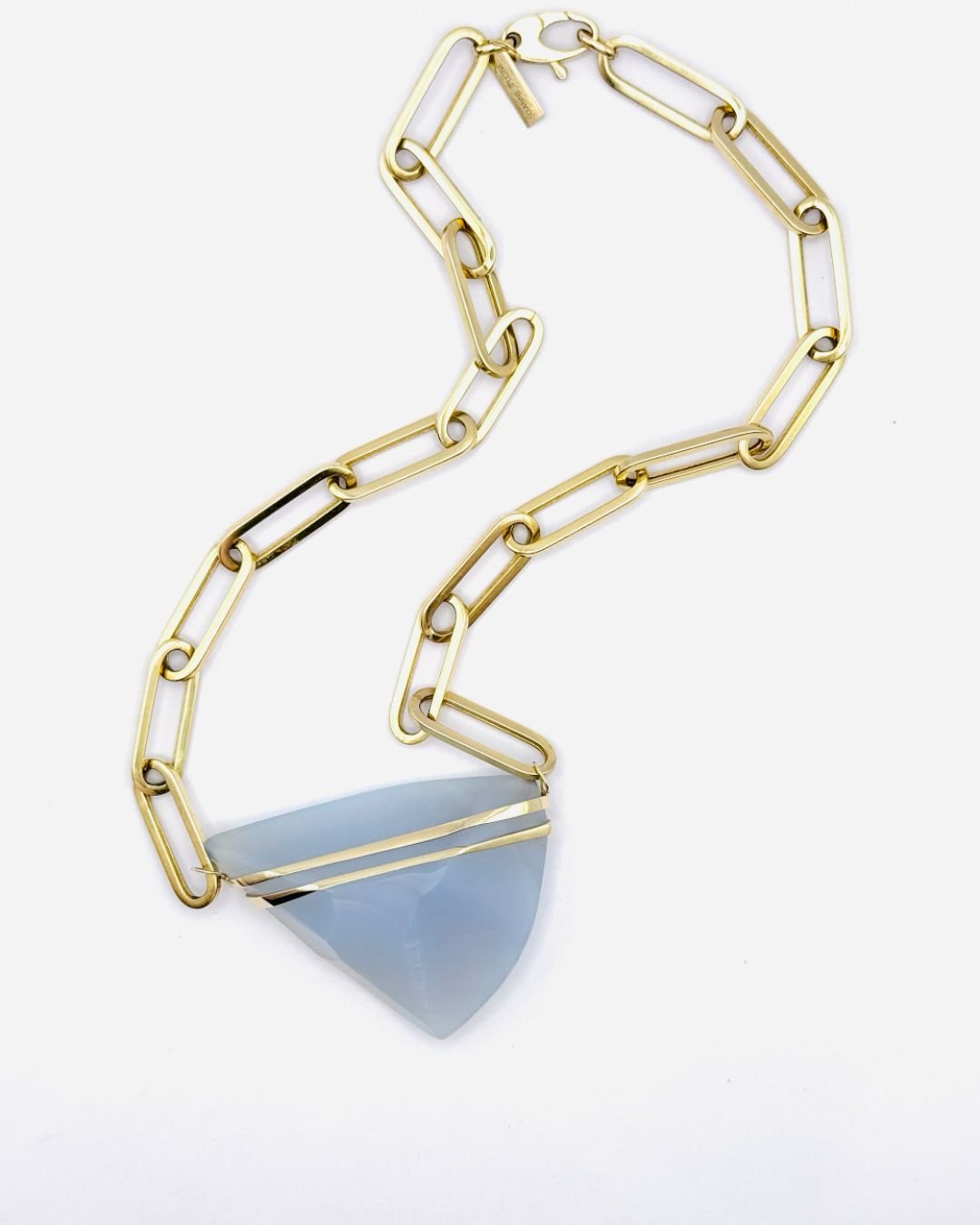 Blue Chalcedony Amulet | Channel un heard information.

Blue-Gray Chalcedony teaches that everything is not what it seems, and grants access to unknown knowledge.

Its color connects with the throat chakra, supporting your confidence as you share you