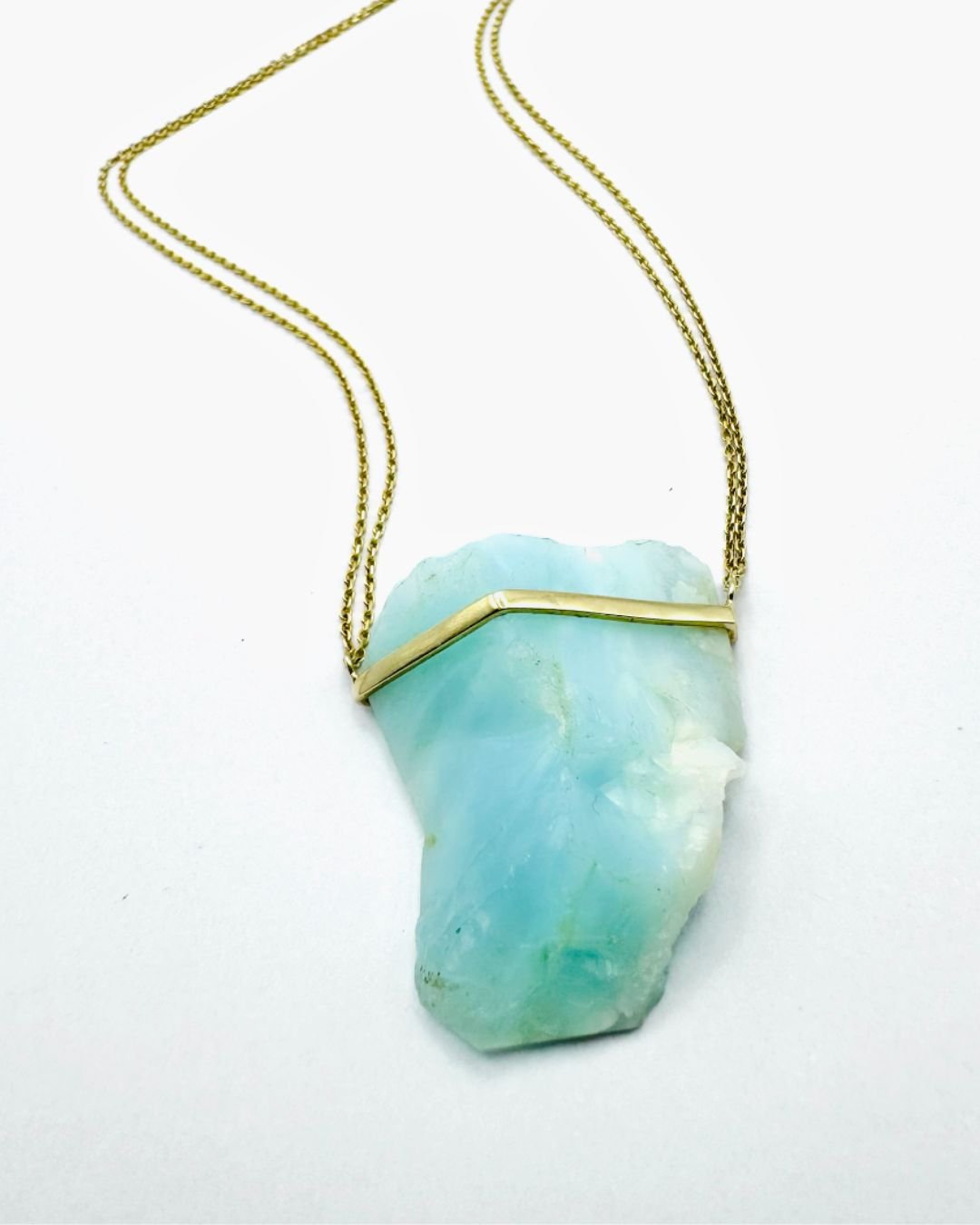 Blue Opal Amulet | A soothing and calming stone.

It promotes emotional healing by encouraging peace and tranquility within oneself. This gemstone helps to alleviate stress and anxiety, providing a sense of serenity and harmony. 

It resonates with t