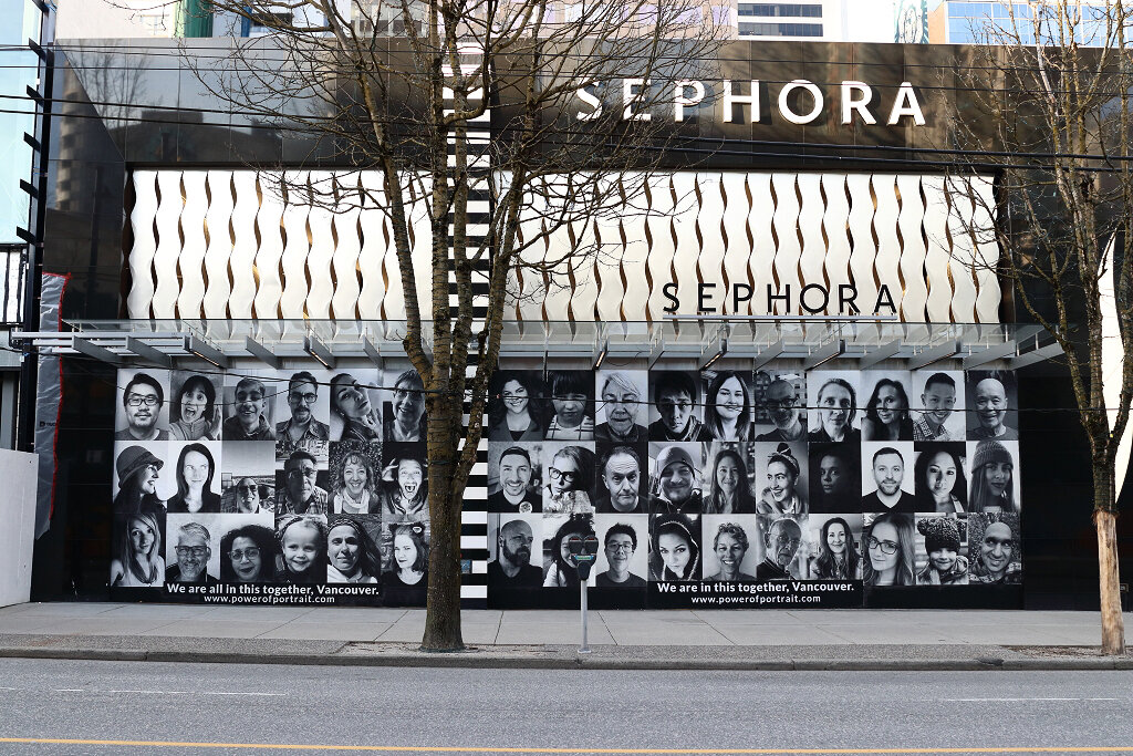 Portrait mural on Robson Street store