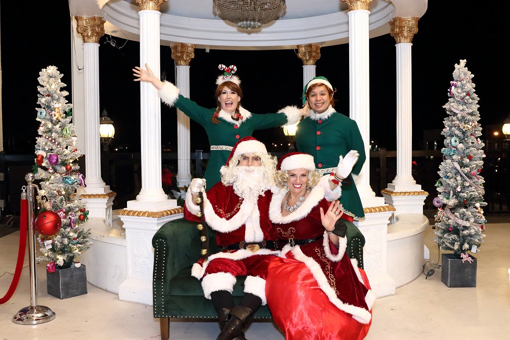Santa and elves at holiday event