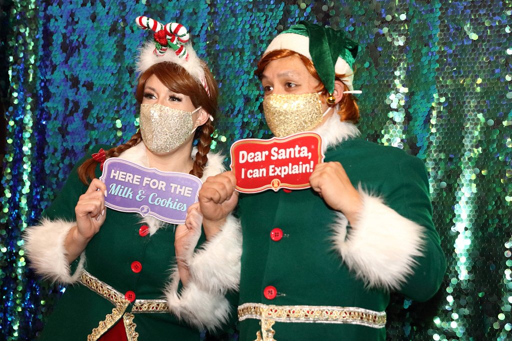 Elves in holiday photobooth