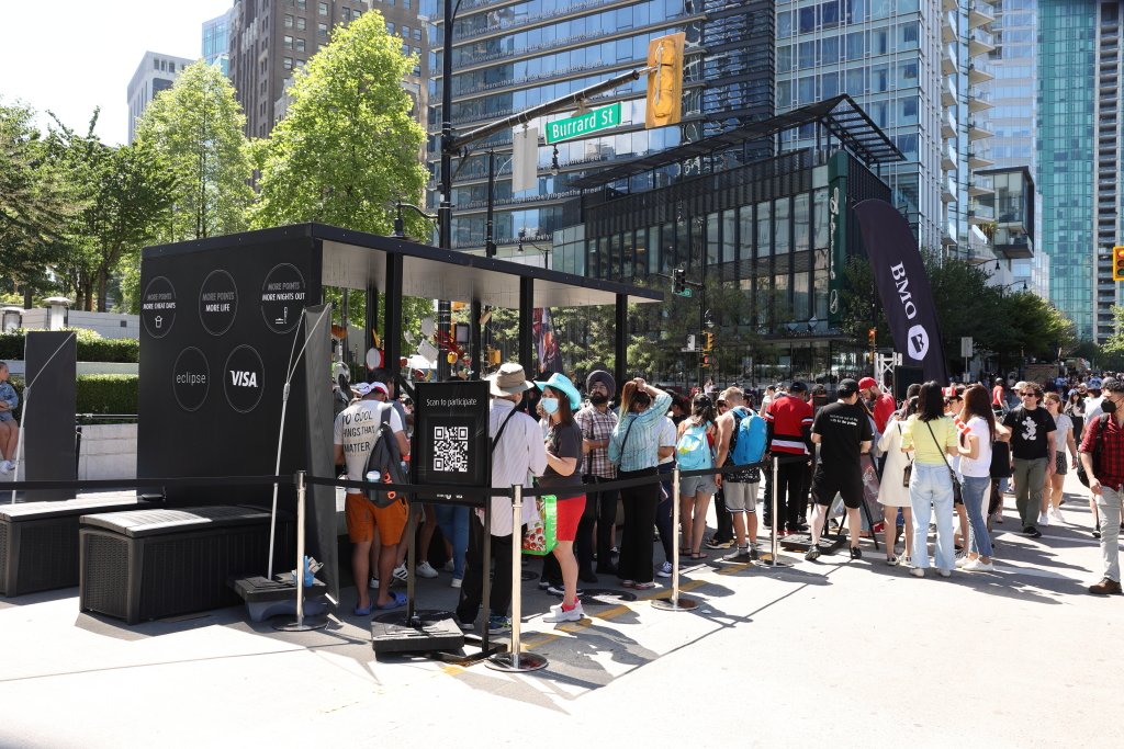 Crowds with brand activation booth
