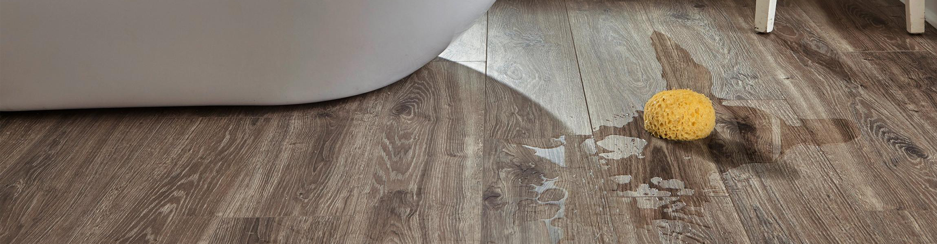 What is the difference between laminate and vinyl flooring?