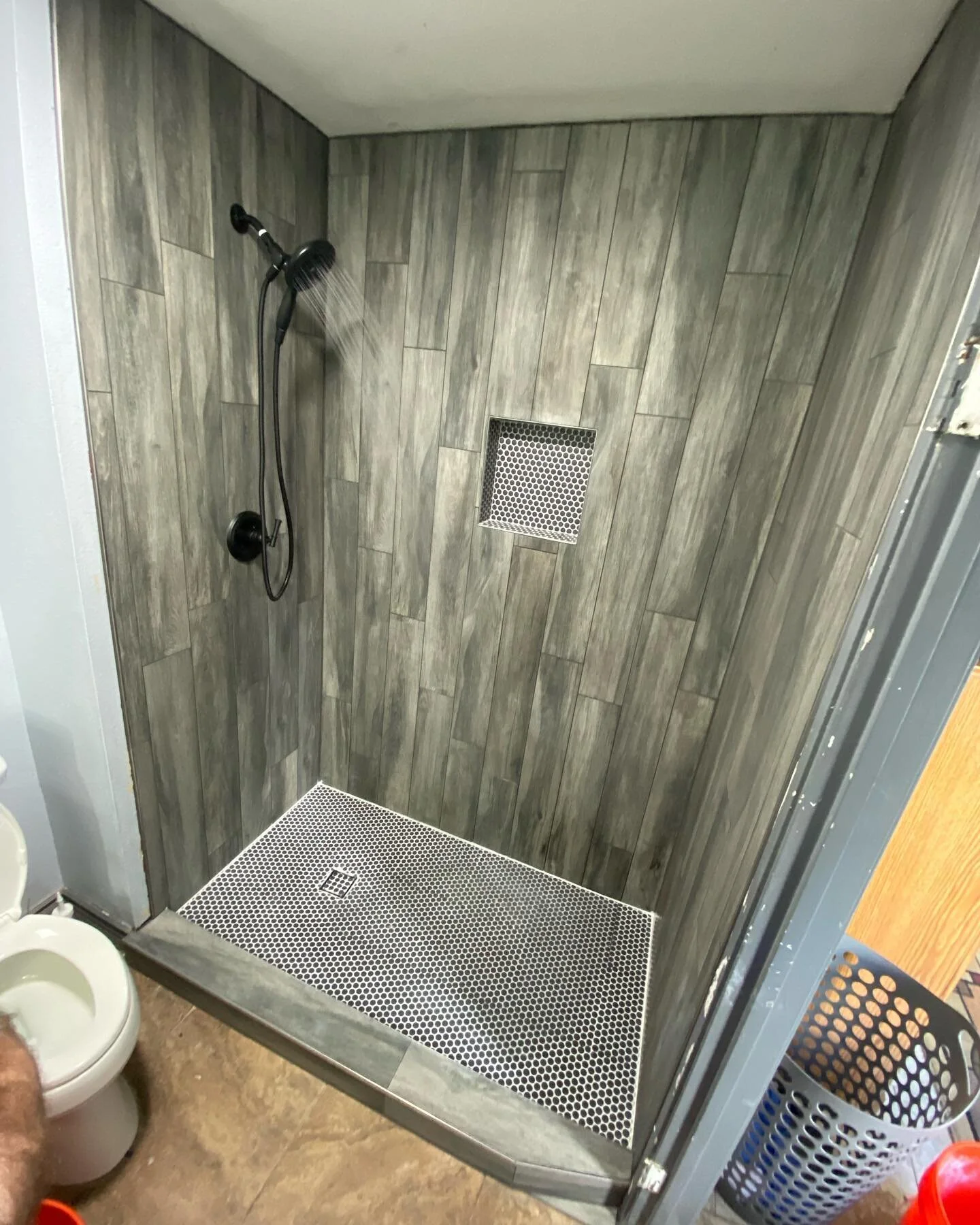 Swipe for before 👀 Recent tub/shower conversion to a walk-in shower that we did in Glendale. The homeowners noticed water coming through the walls in their hallway, and contacted us to come out and help diagnose the root of the issue&hellip; we info