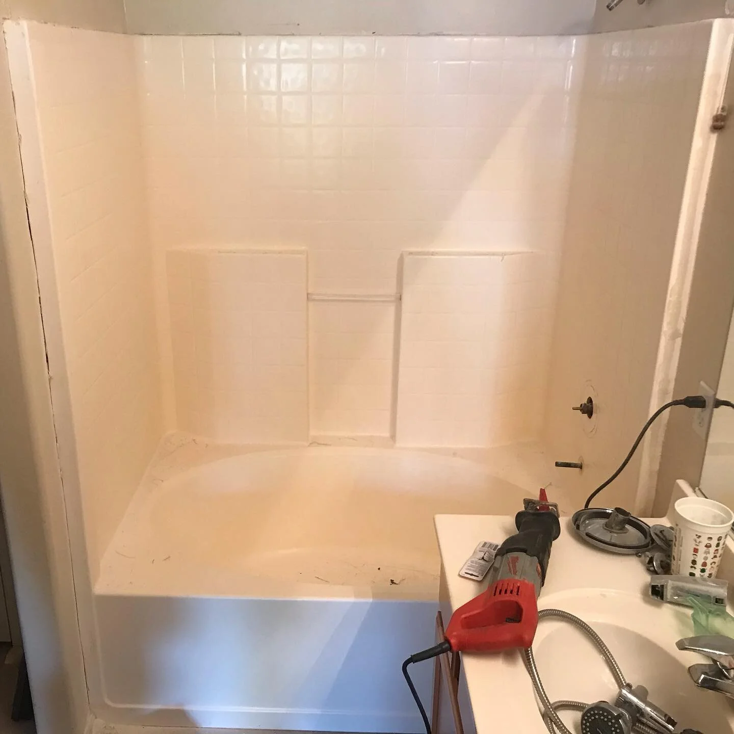 Before &amp; After pictures of a recent tub &amp; surround remodel into a curbless walk-in shower. We did this project for an elderly lady that needed the ability to step into the shower without having to risk tripping on a bathtub edge, or a bulky s