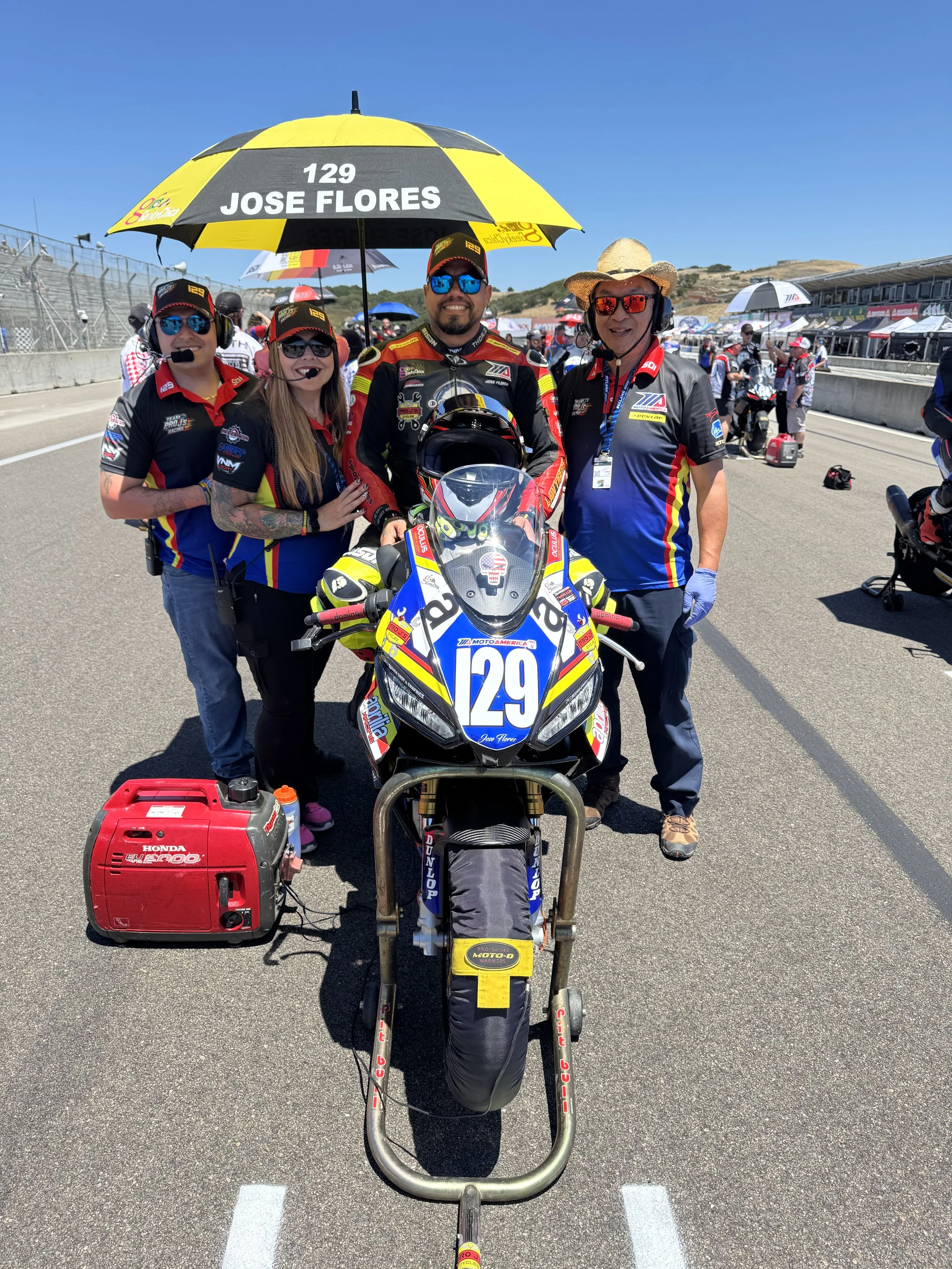 Jose Flores Racing with his Crew Chief, Team Manager GeekyChica and his Medic Bryan Delgado at MotoAmerica Weather Tech Laguna Seca