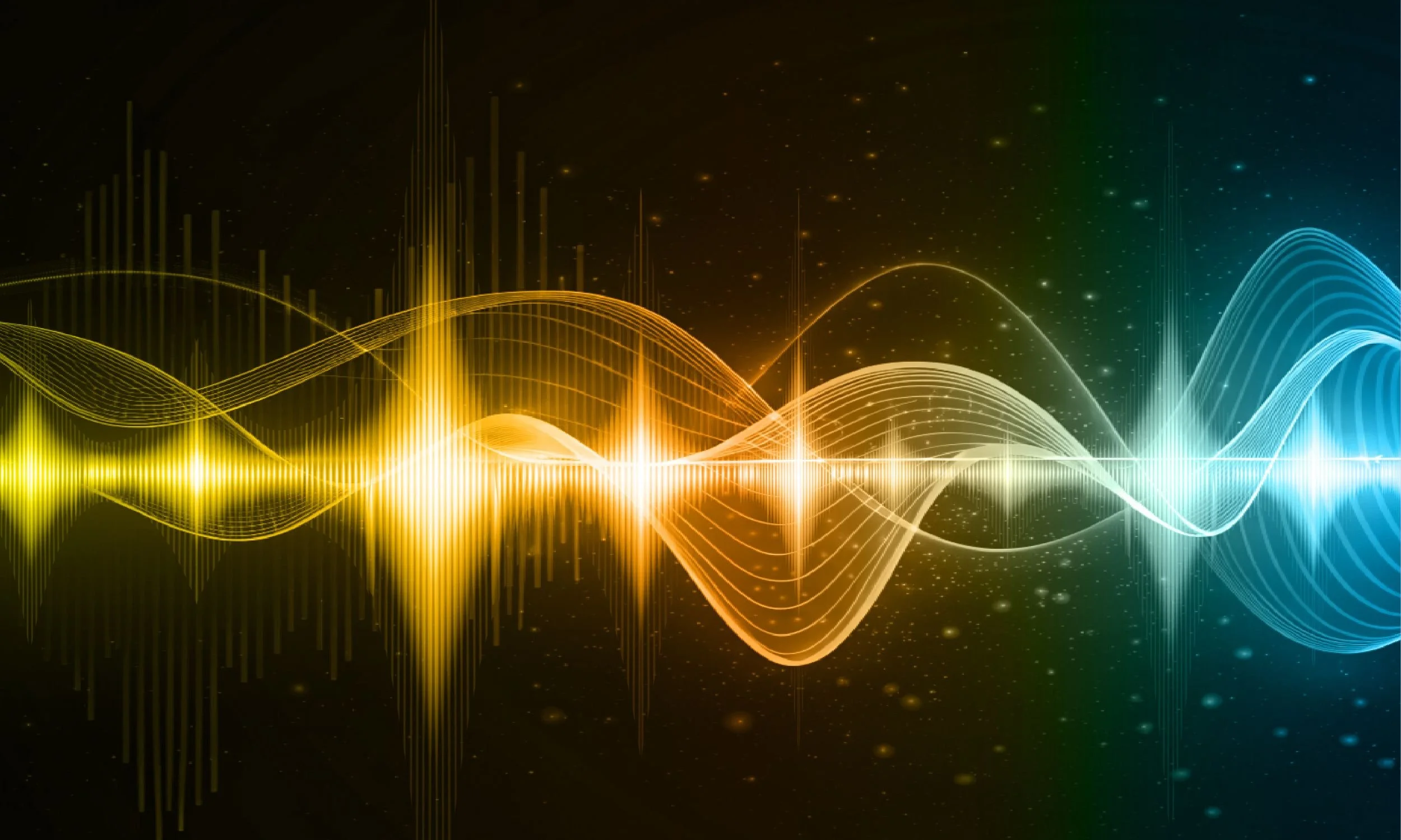 Abstract visualization of sound waves with a gradient from yellow to blue against a dark background with glowing particles.