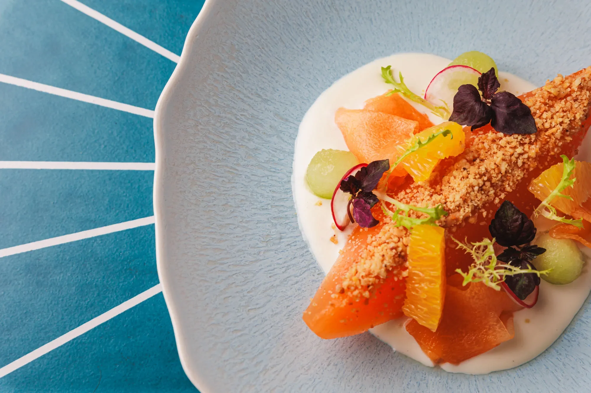 Photoshoot of a melon dish at an Asian restaurant in Abu Dhabi