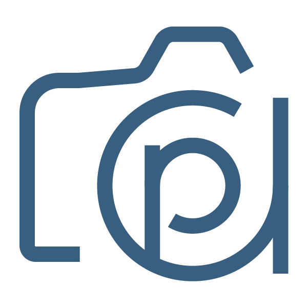 Icon of a camera with a folded corner and a refresh symbol in the center.