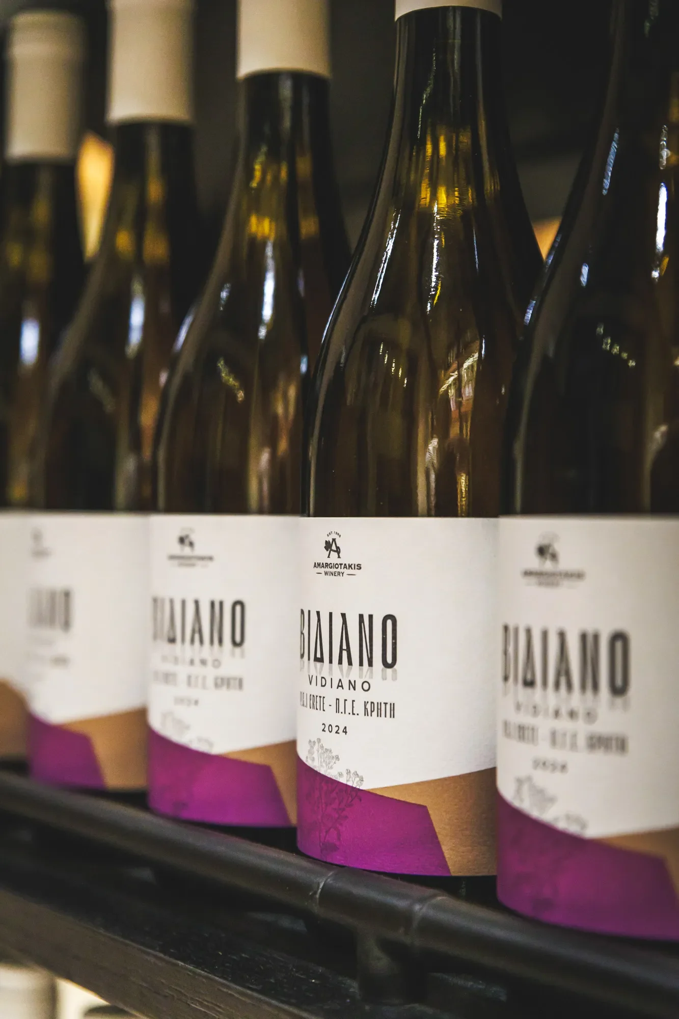 Row of Vidiano wine bottles at a wine shop in Heraklion, Crete