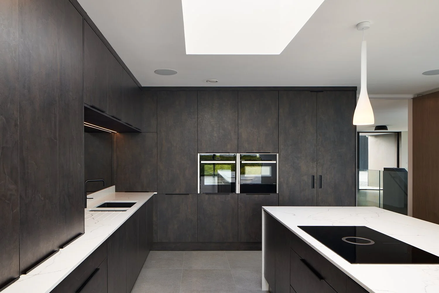 Modern kitchen design in a new-build home by FourSeven Homes, photographed by David Cordner.