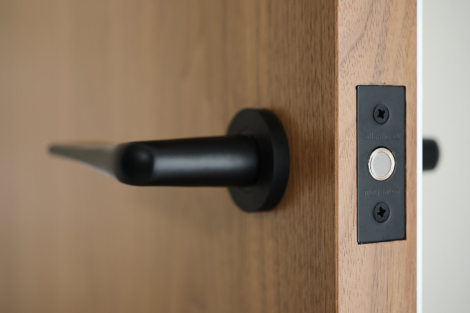 Architectural photography detail of magnetic door latch.JPG