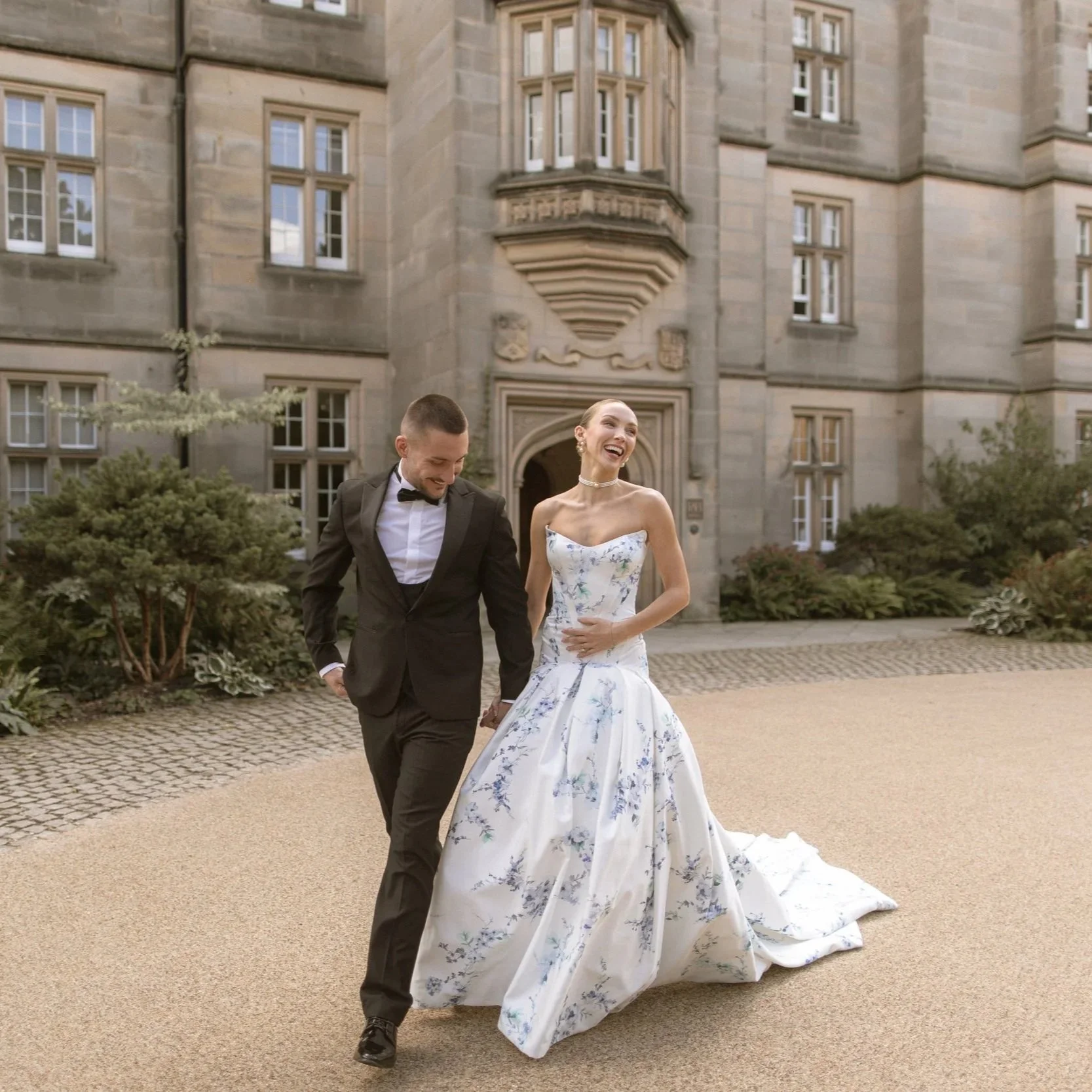 Geometric drawing of an outline square with sections divided by vertical, horizontal, and half circle lines.