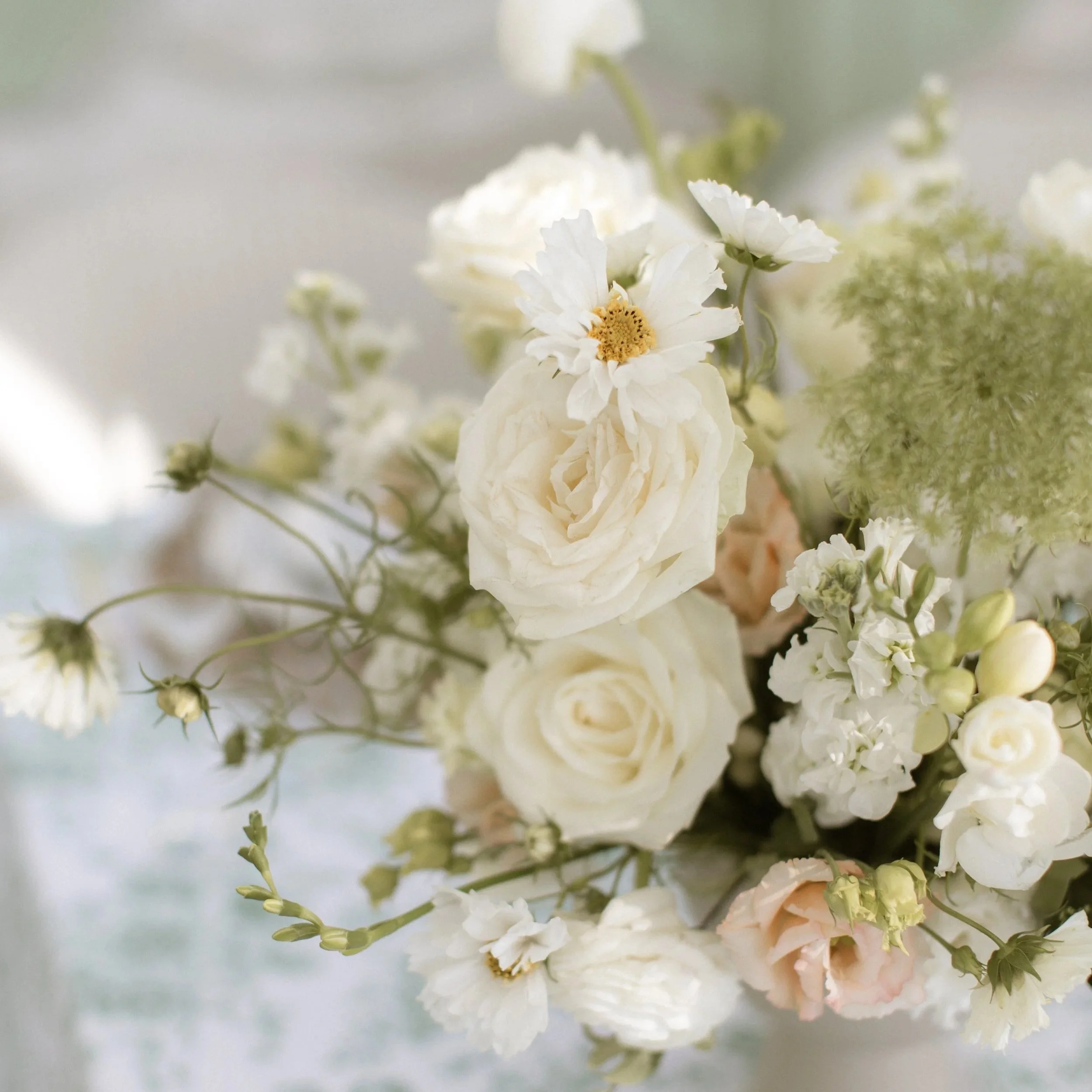 Geometric drawing of an outline square with sections divided by vertical, horizontal, and circle lines.