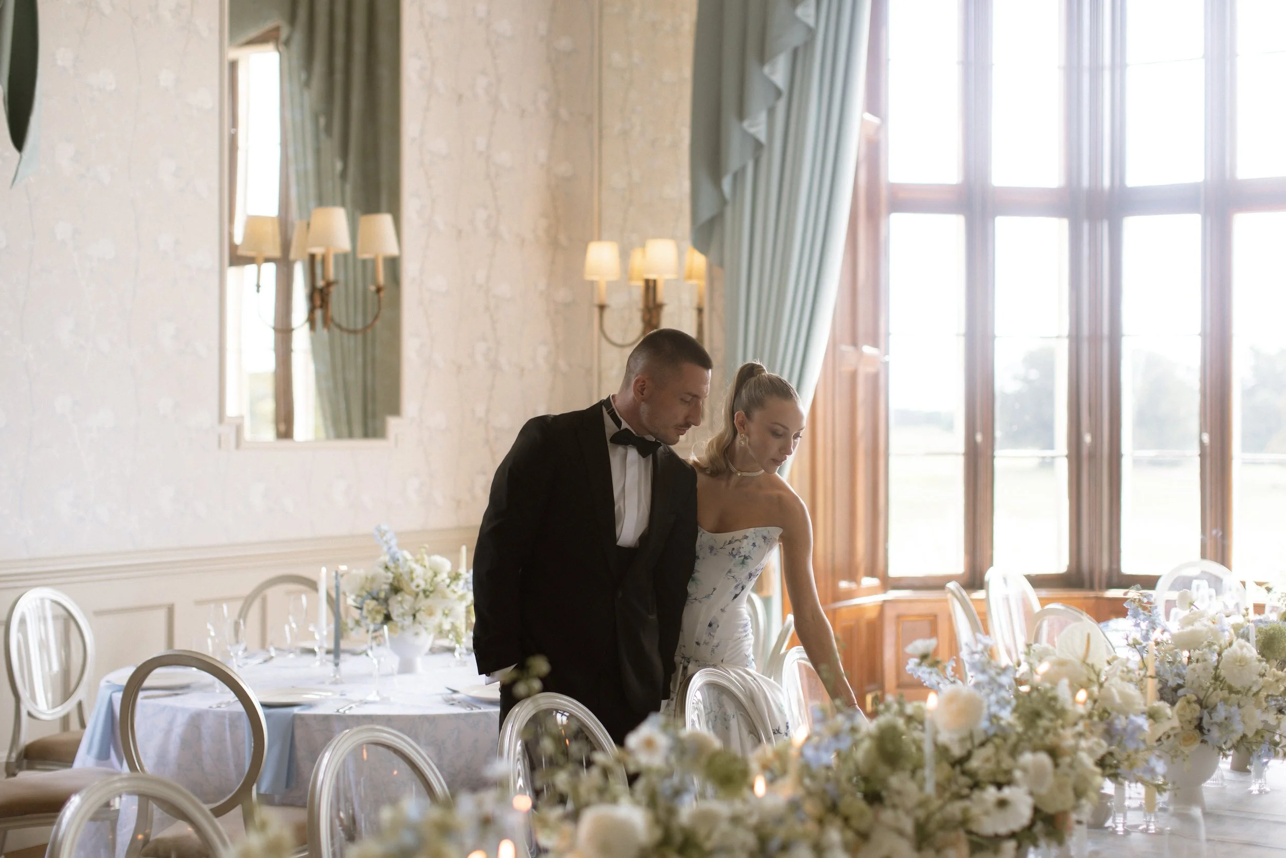 Geometric drawing of an outline square with sections divided by vertical, horizontal, and diagonal lines.