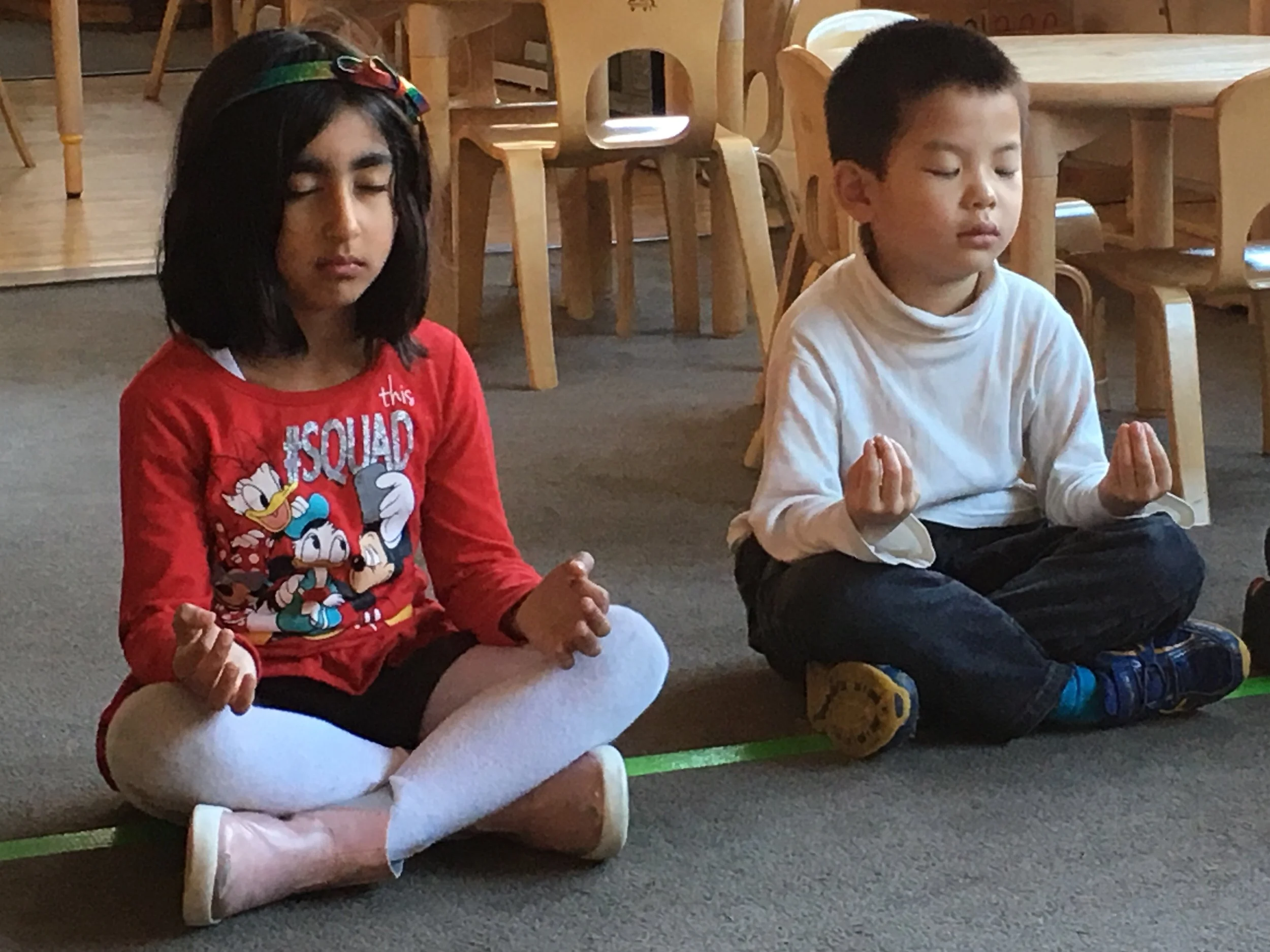 Two friends pause for a moment to find their breath during the busy day!
