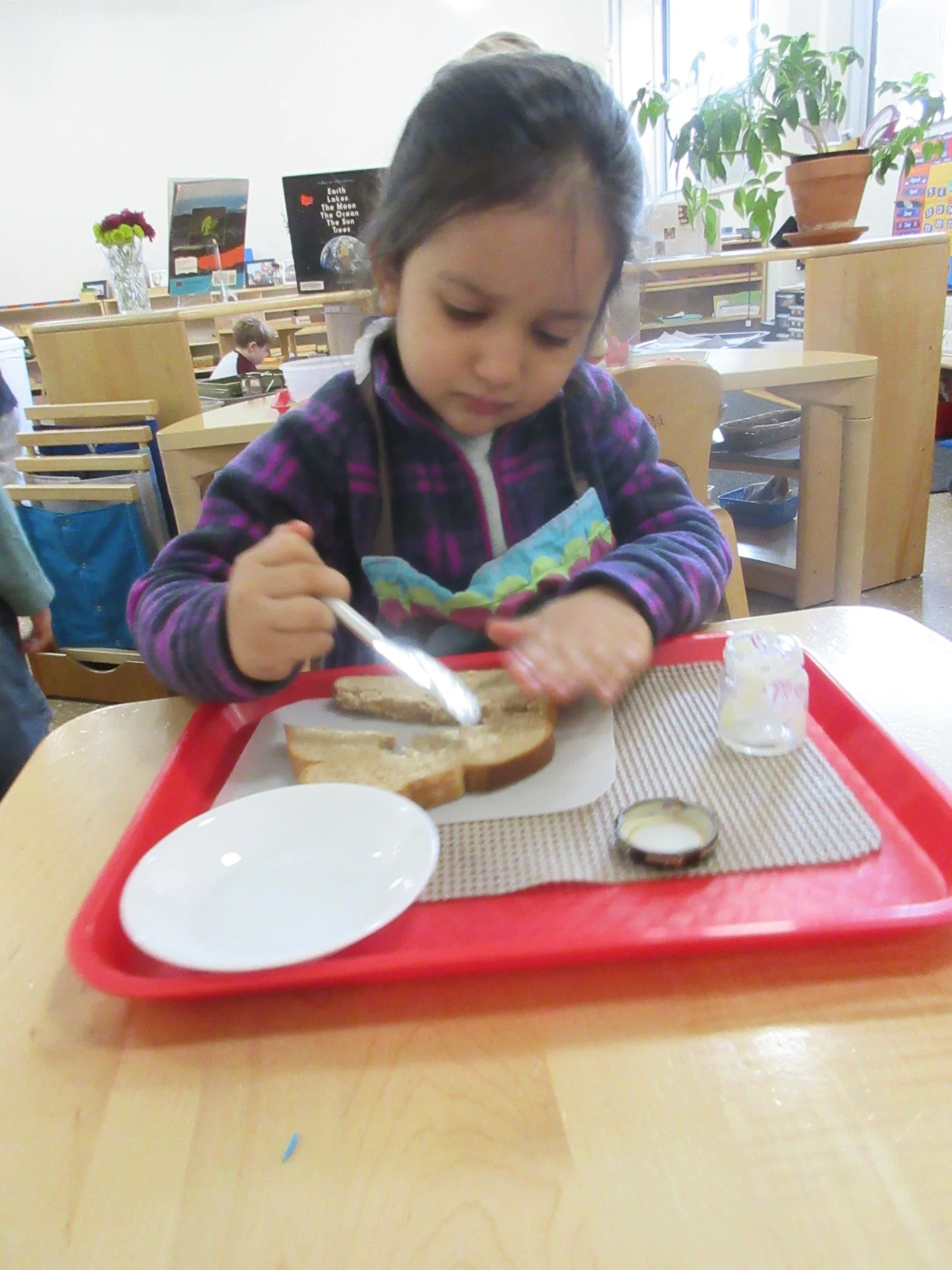 Spreading butter on bread as a food preparation work