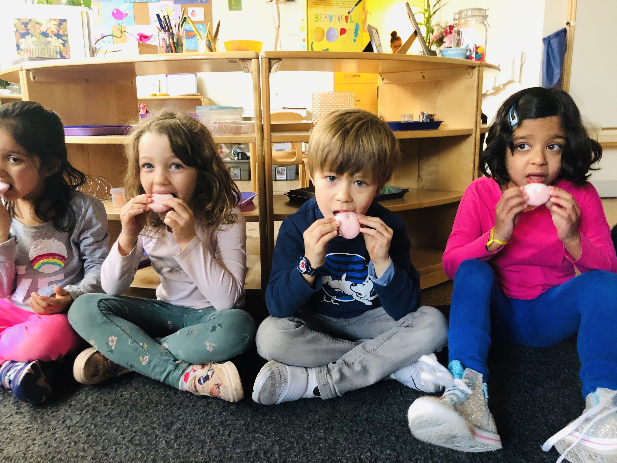 Tasting strawberry mochi at circle time!