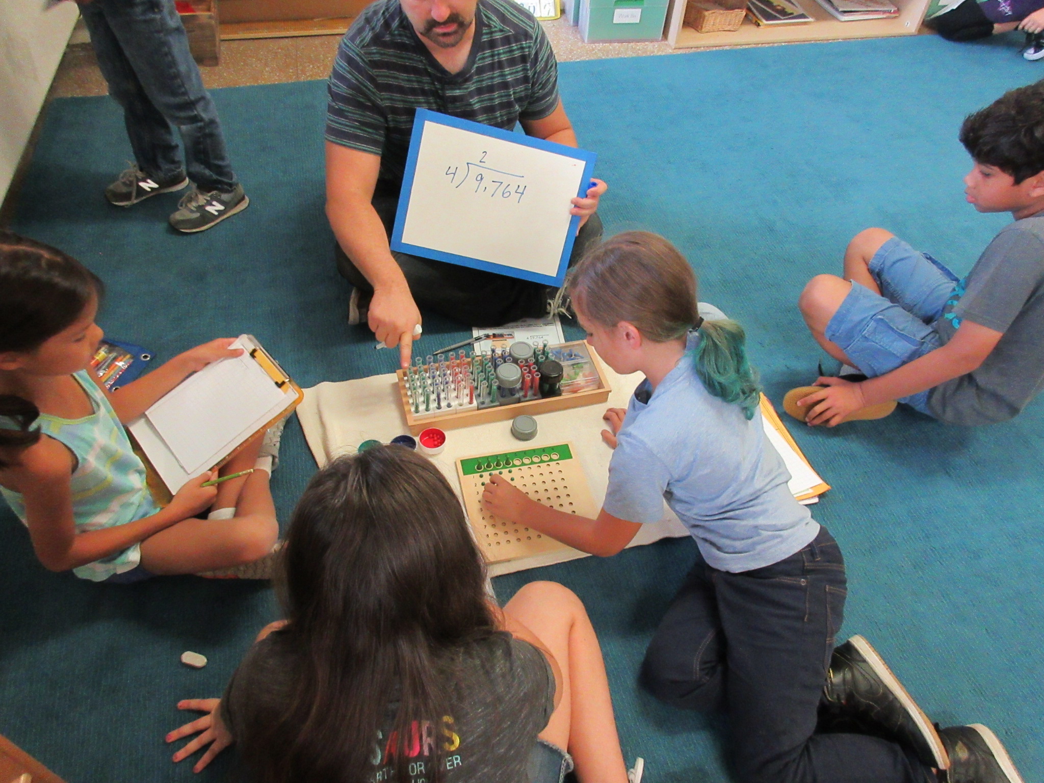 Long division lesson using test tube beads