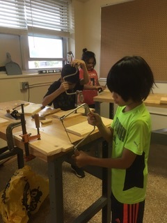Lynn using the Coping saw.jpeg